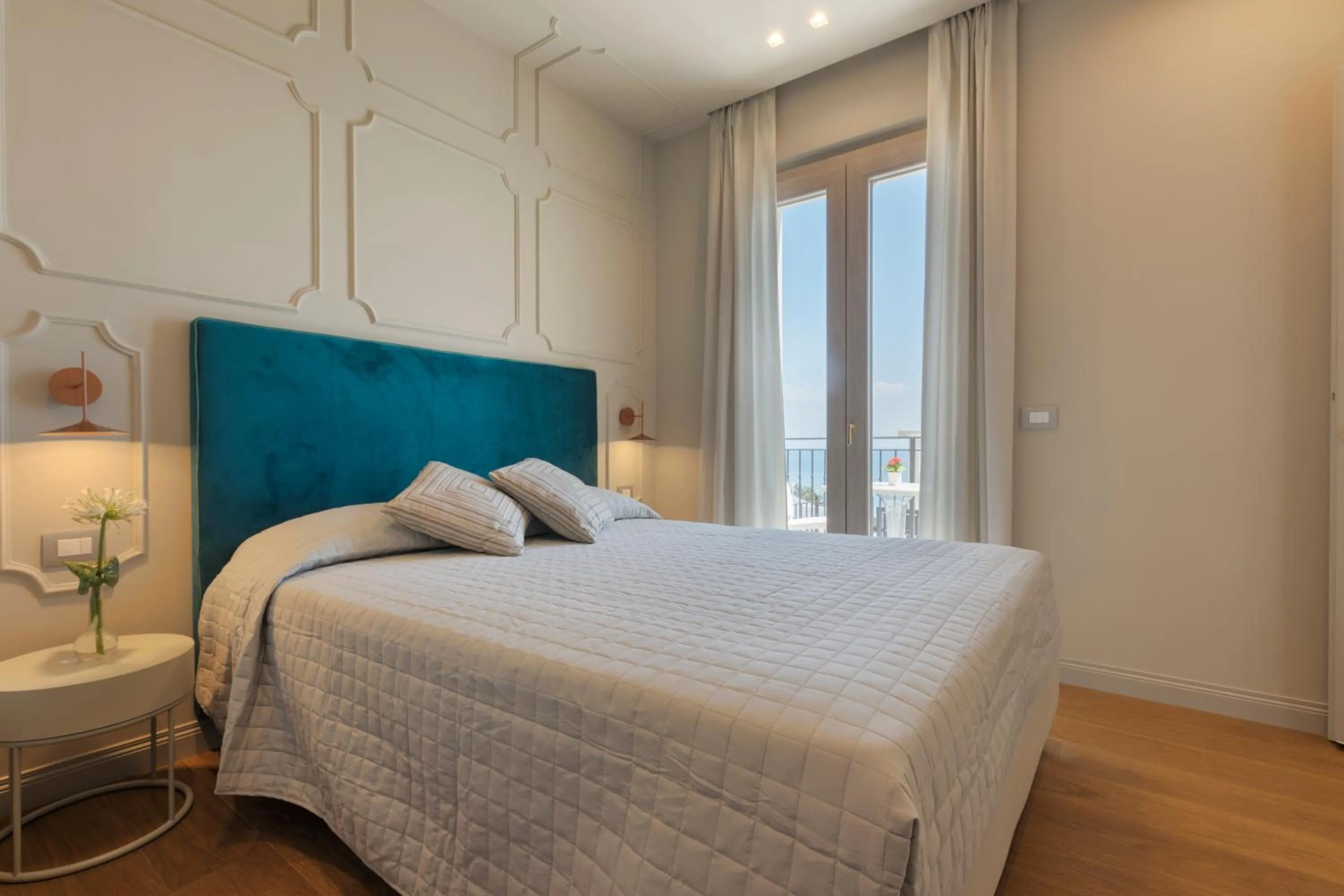 Bed in Diecidodici BoutiqueRooms