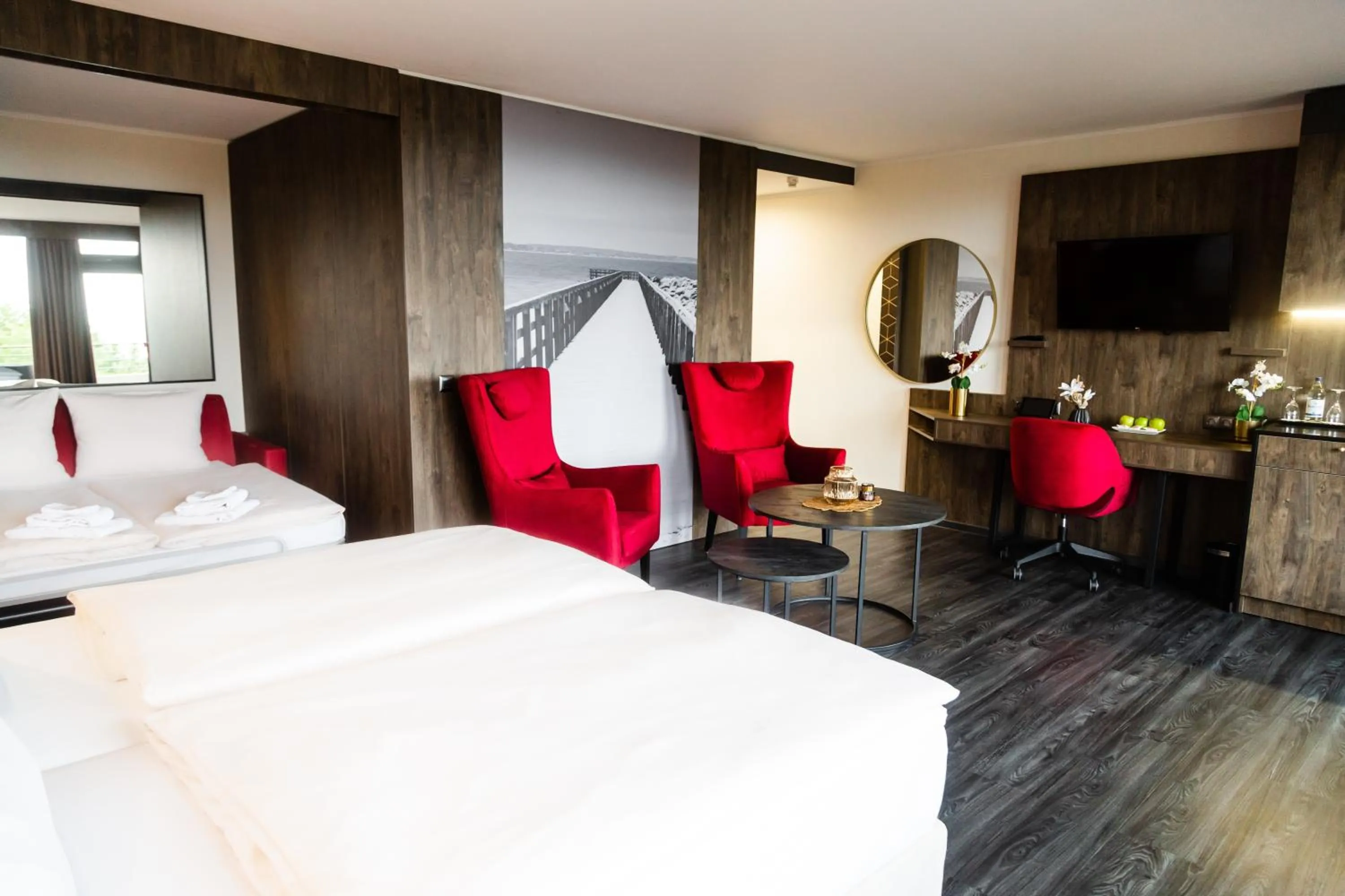 Photo of the whole room, Bed in PLAZA Premium Timmendorfer Strand