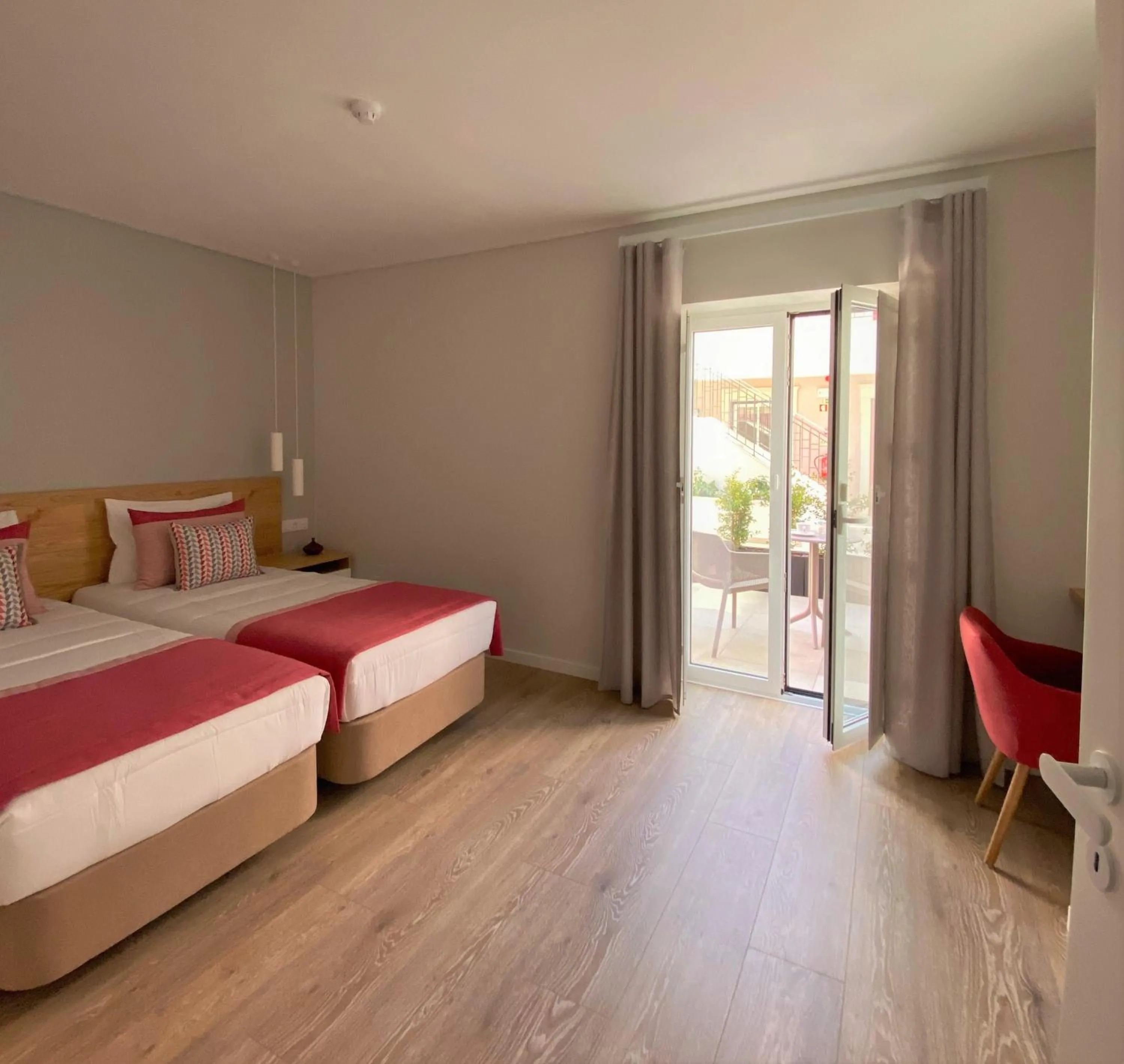 Bed in Cardeal Suites & Apartments