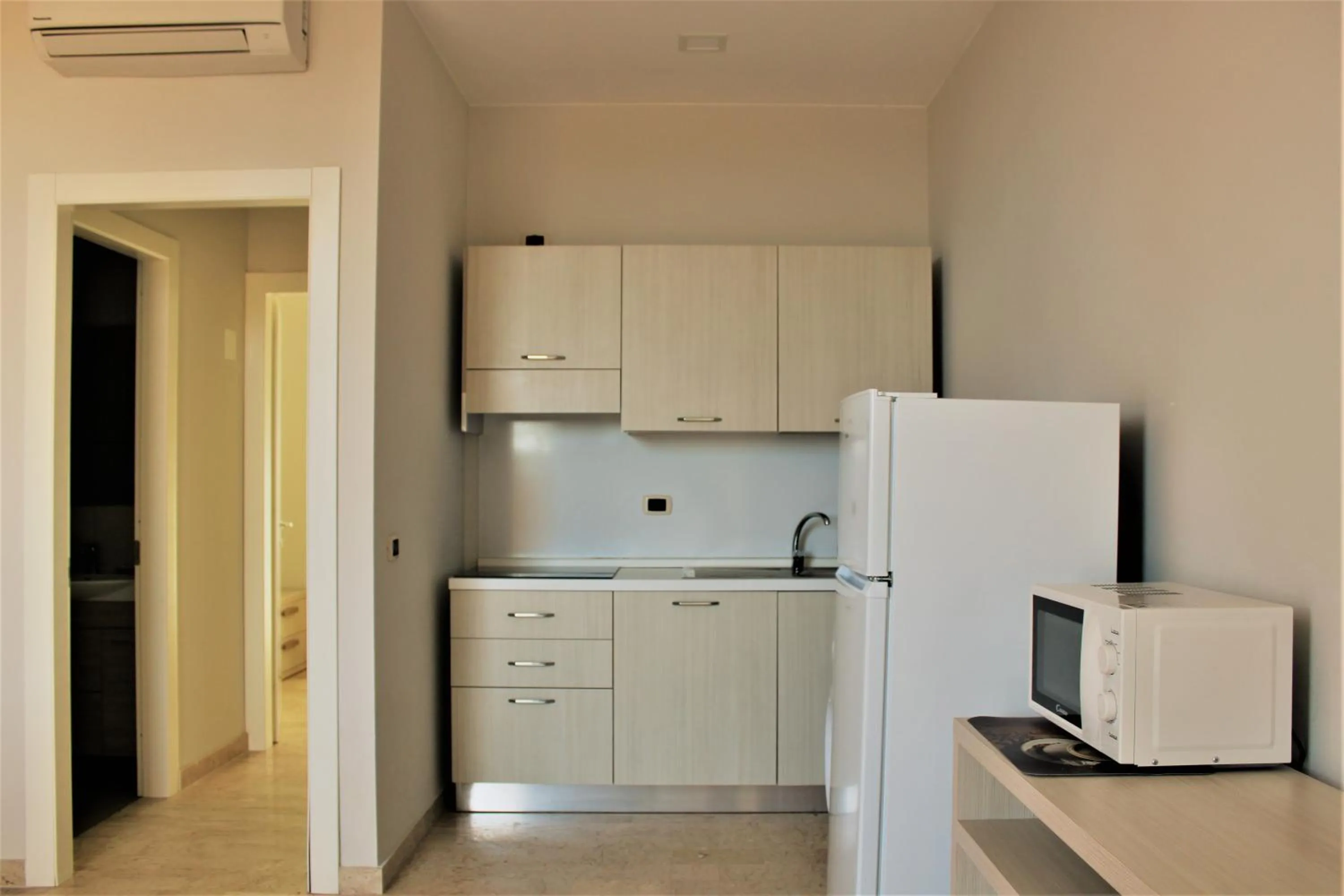 Kitchen or kitchenette in Zibibbo Beach Apartments - Trapani