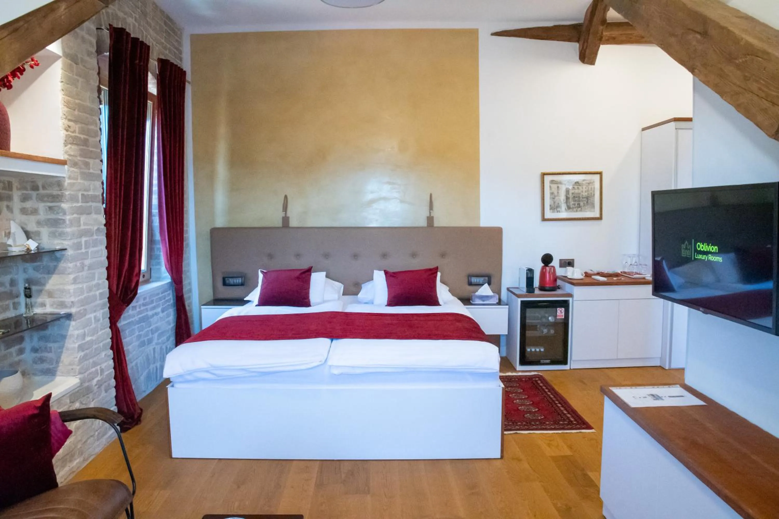 Bed in Oblivion Luxury Rooms