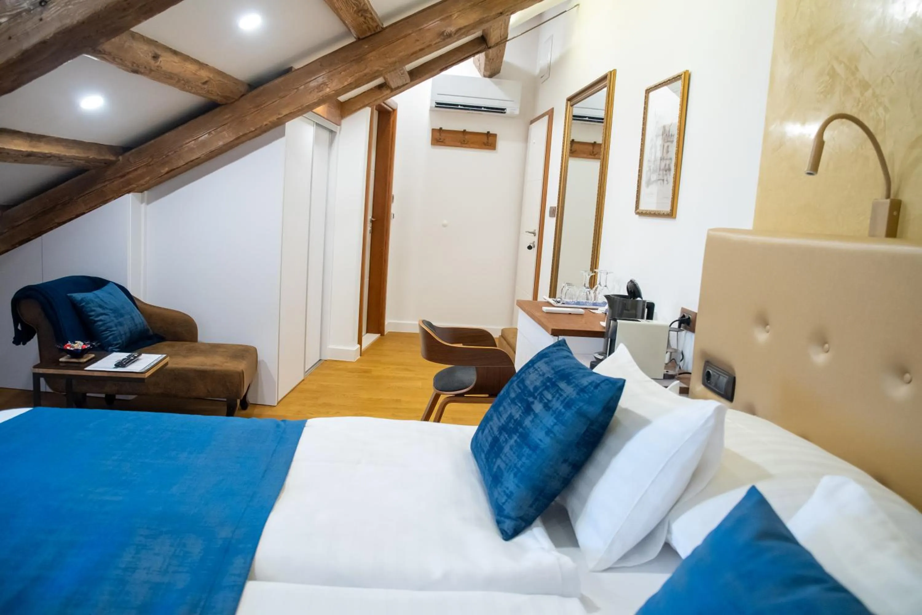 Bed in Oblivion Luxury Rooms