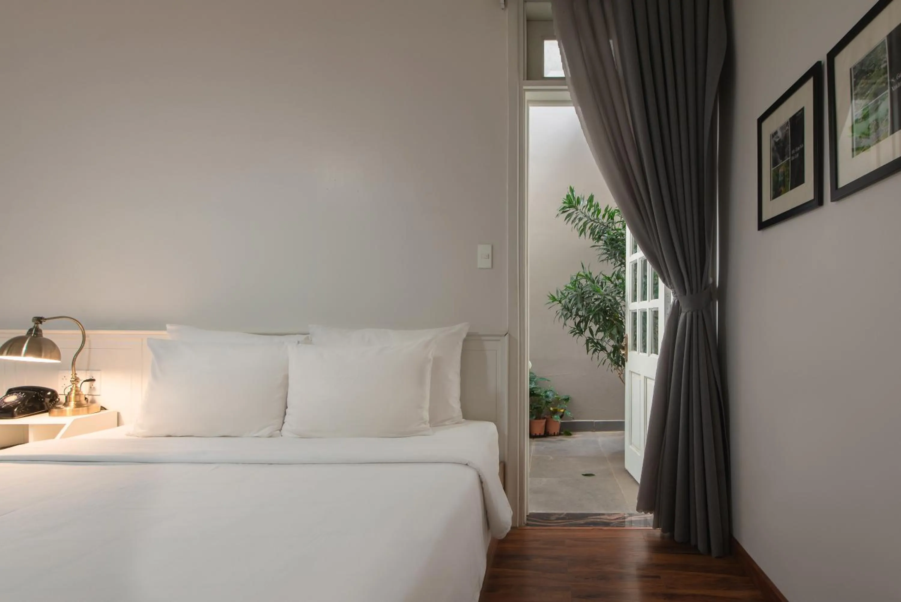 Bed in Le Soleil Boutique Hotel