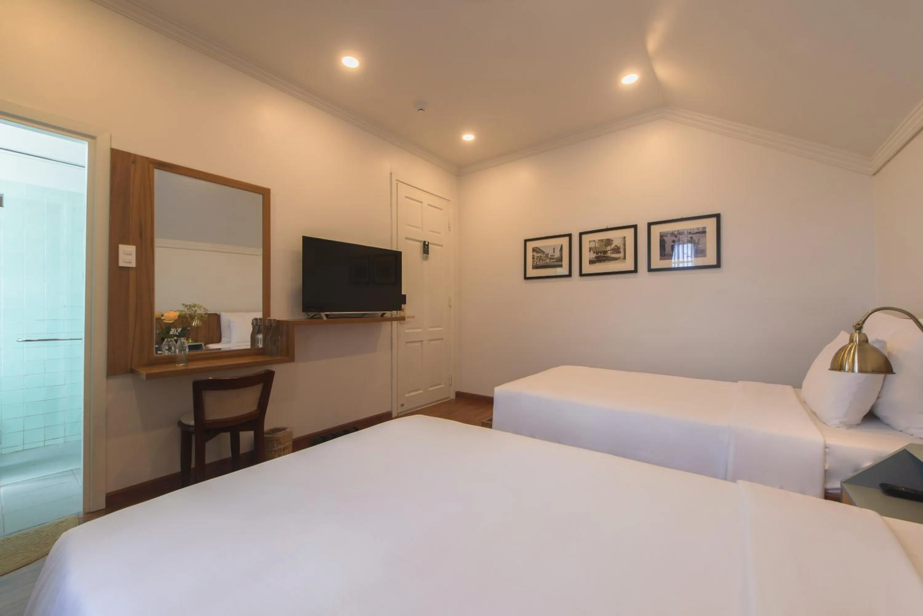 Bed in Le Soleil Boutique Hotel