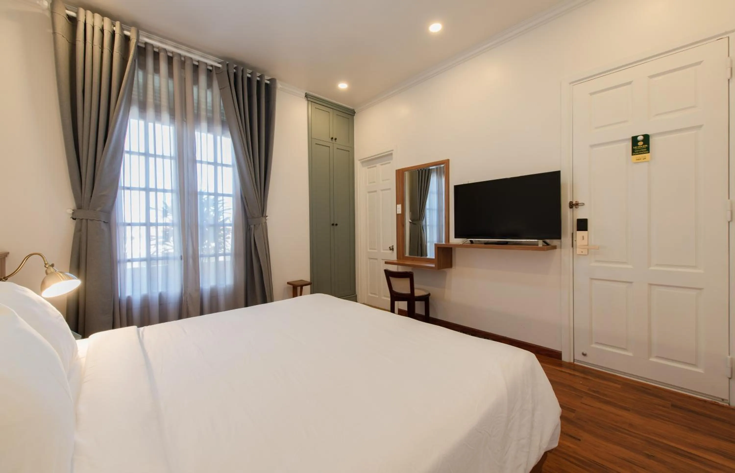 Bed in Le Soleil Boutique Hotel