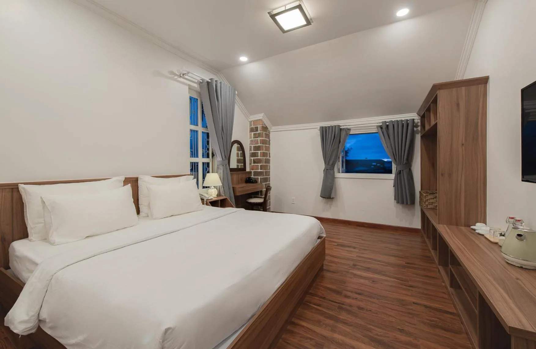 Bed in Le Soleil Boutique Hotel