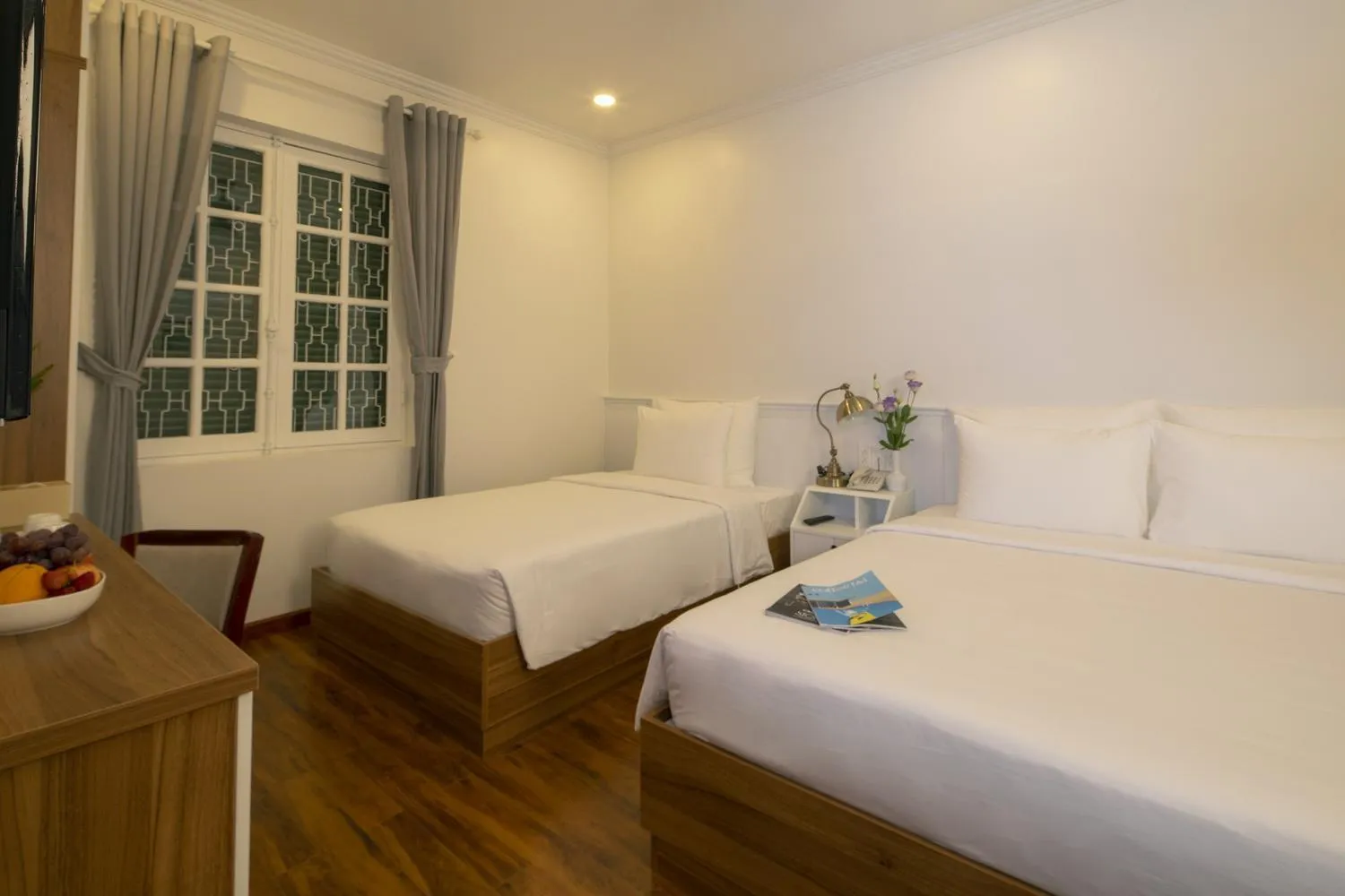 Bed in Le Soleil Boutique Hotel