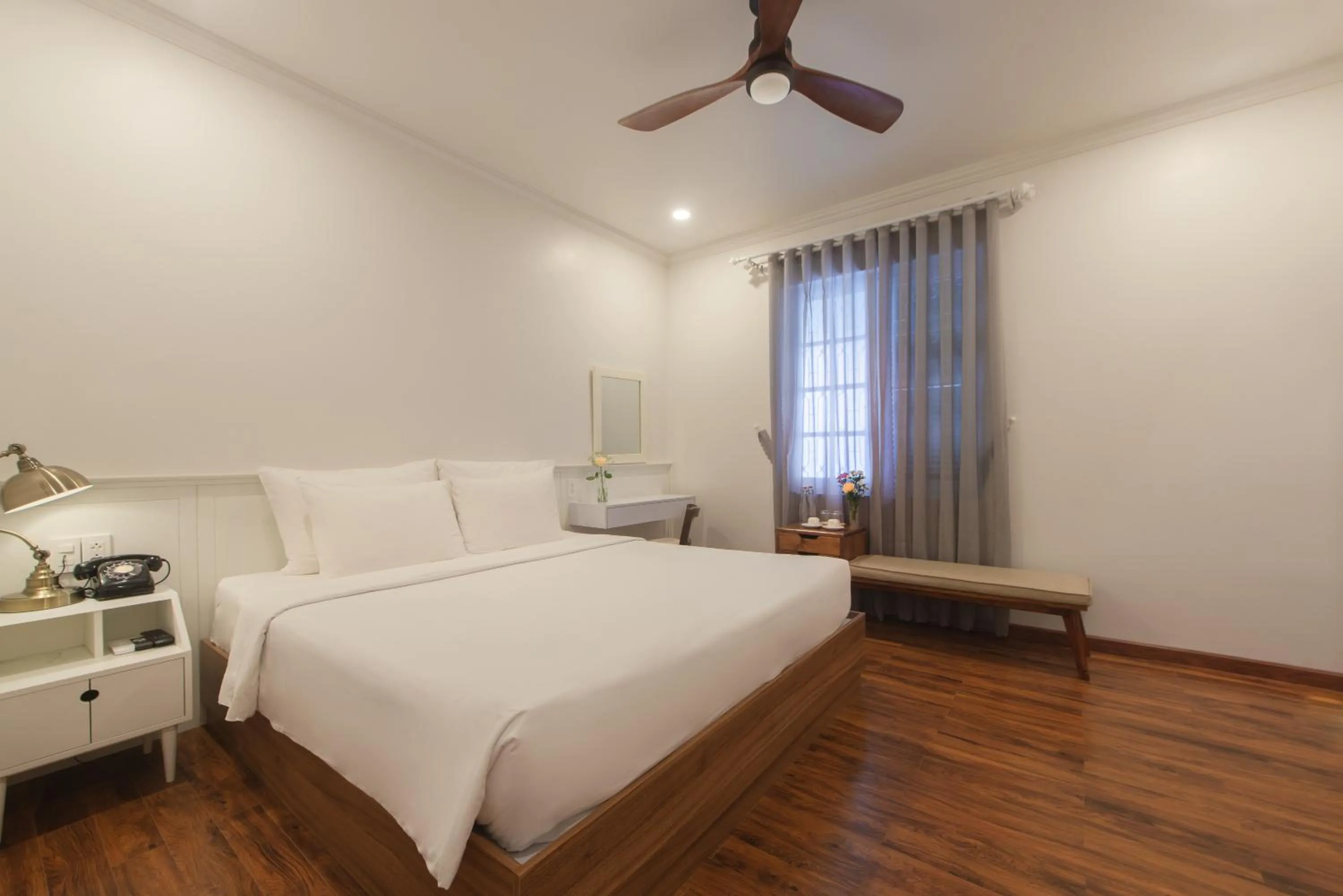 Bed in Le Soleil Boutique Hotel