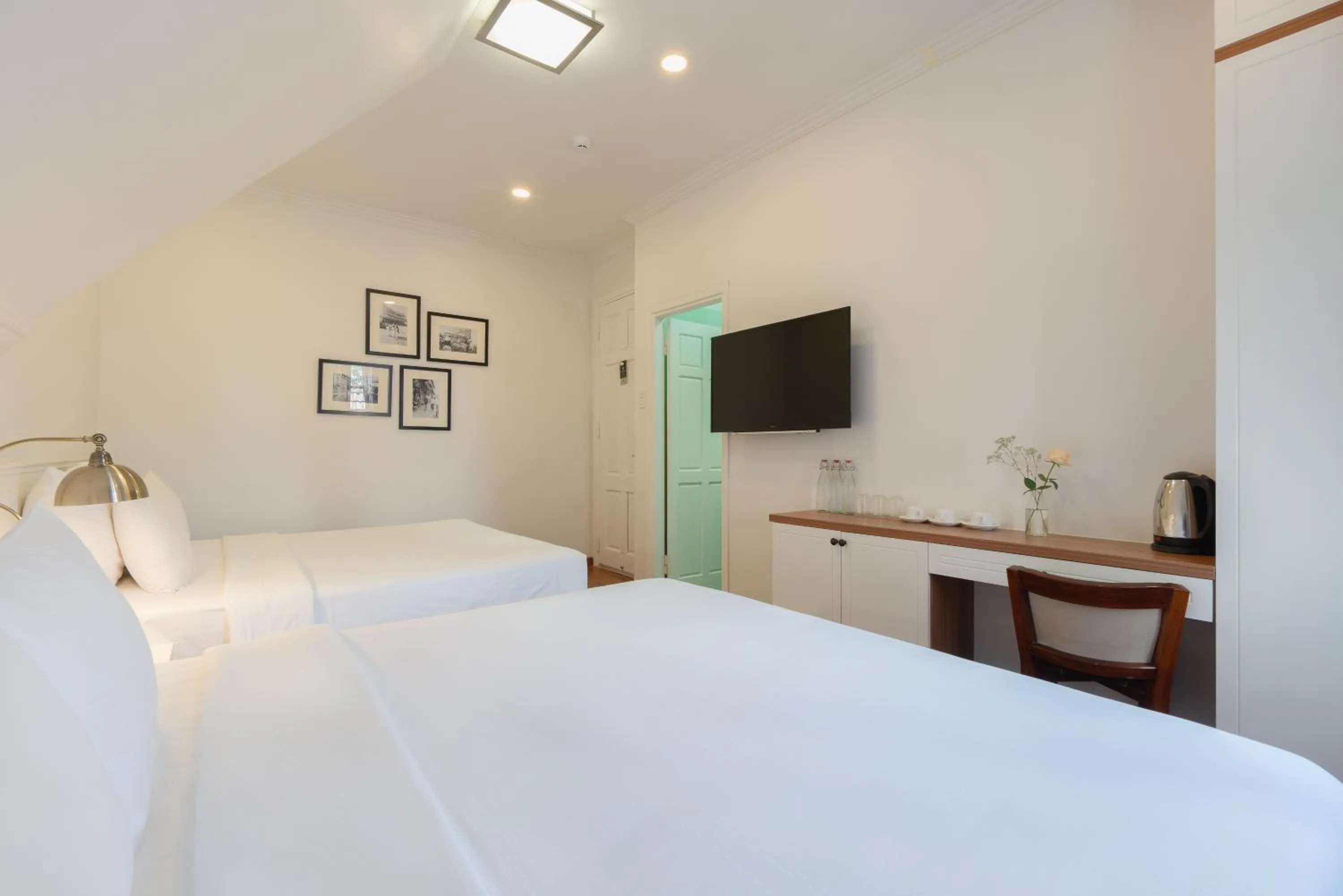 Bed in Le Soleil Boutique Hotel