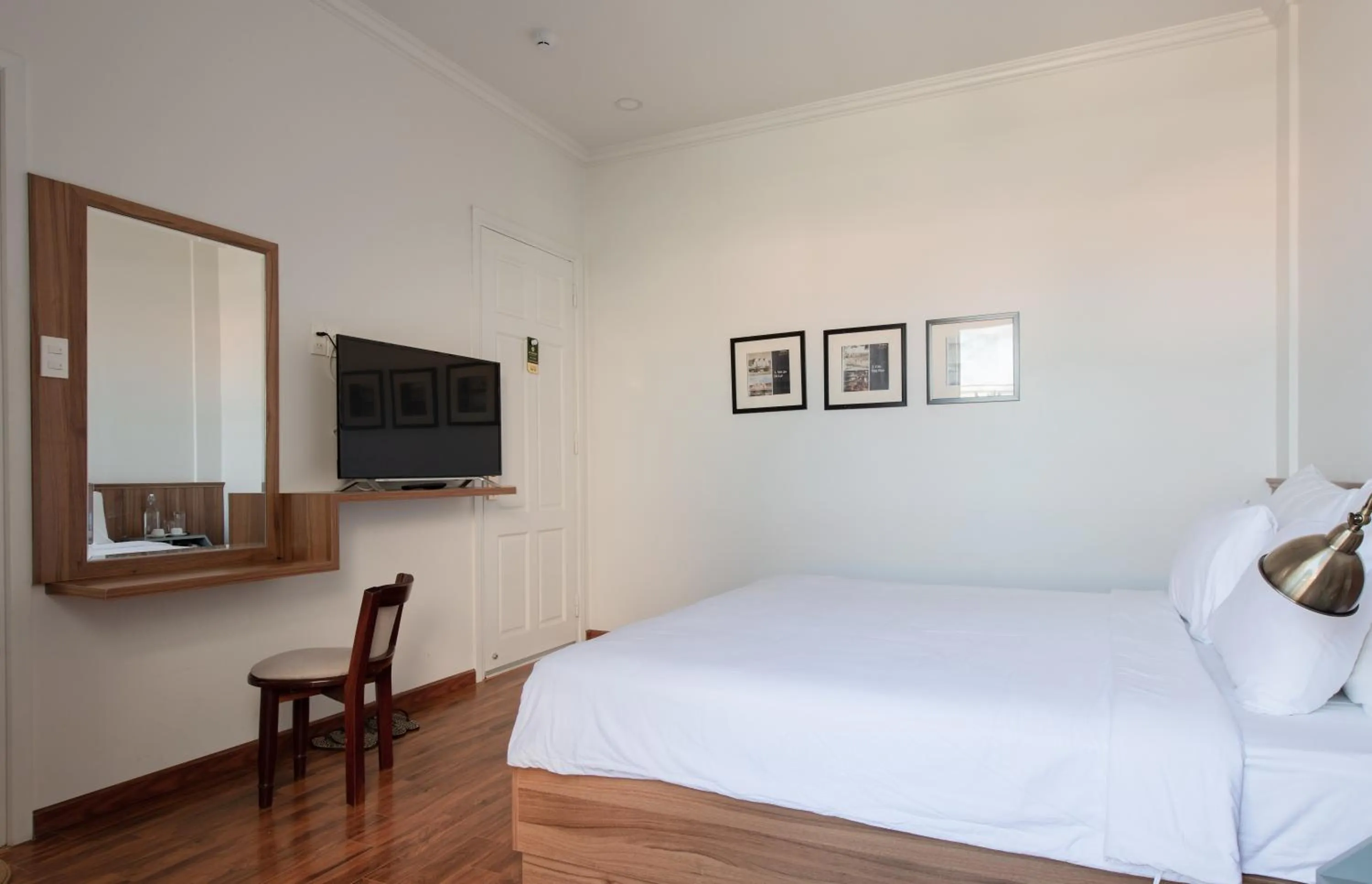 Bed in Le Soleil Boutique Hotel