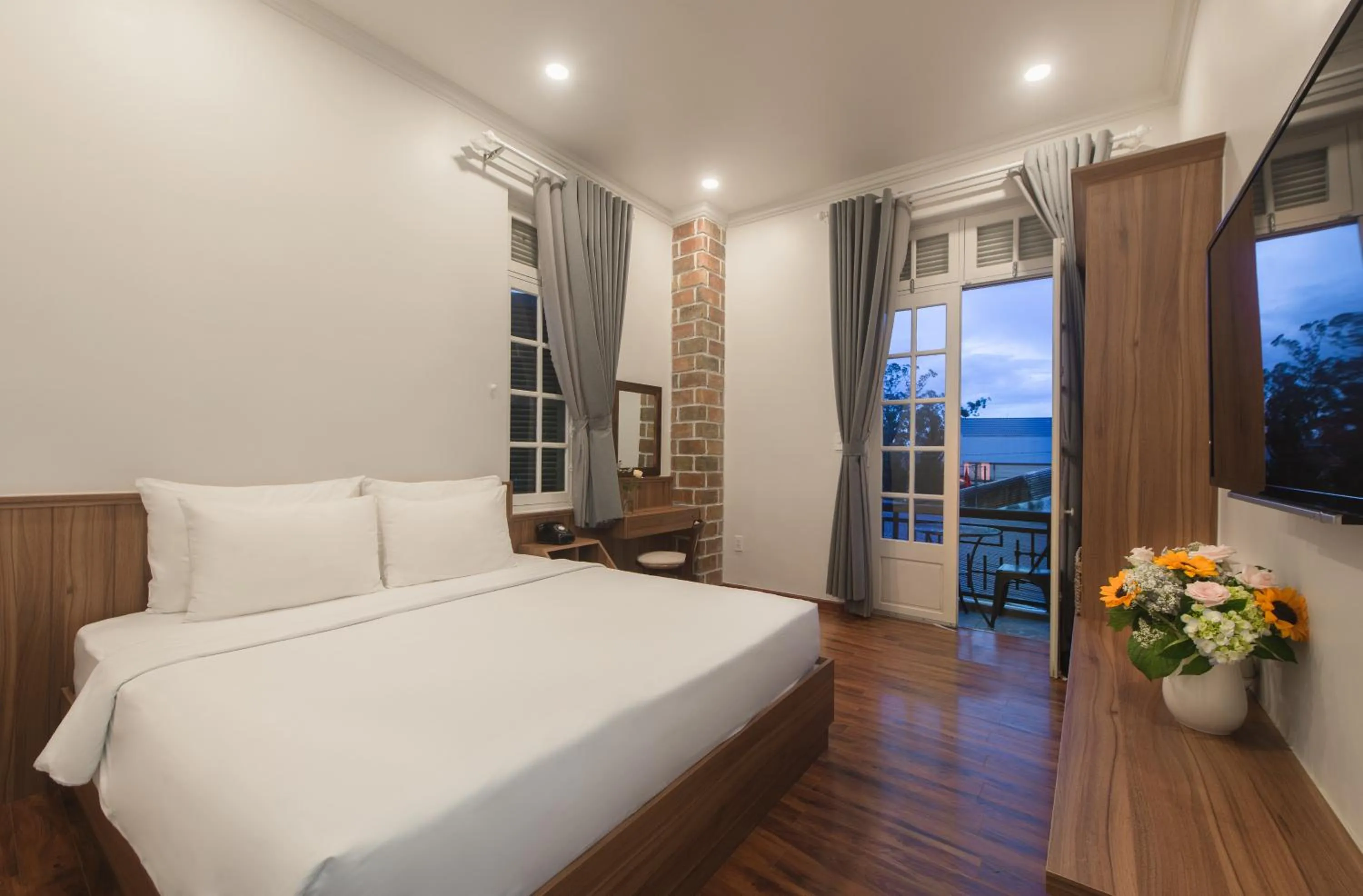 Bed in Le Soleil Boutique Hotel