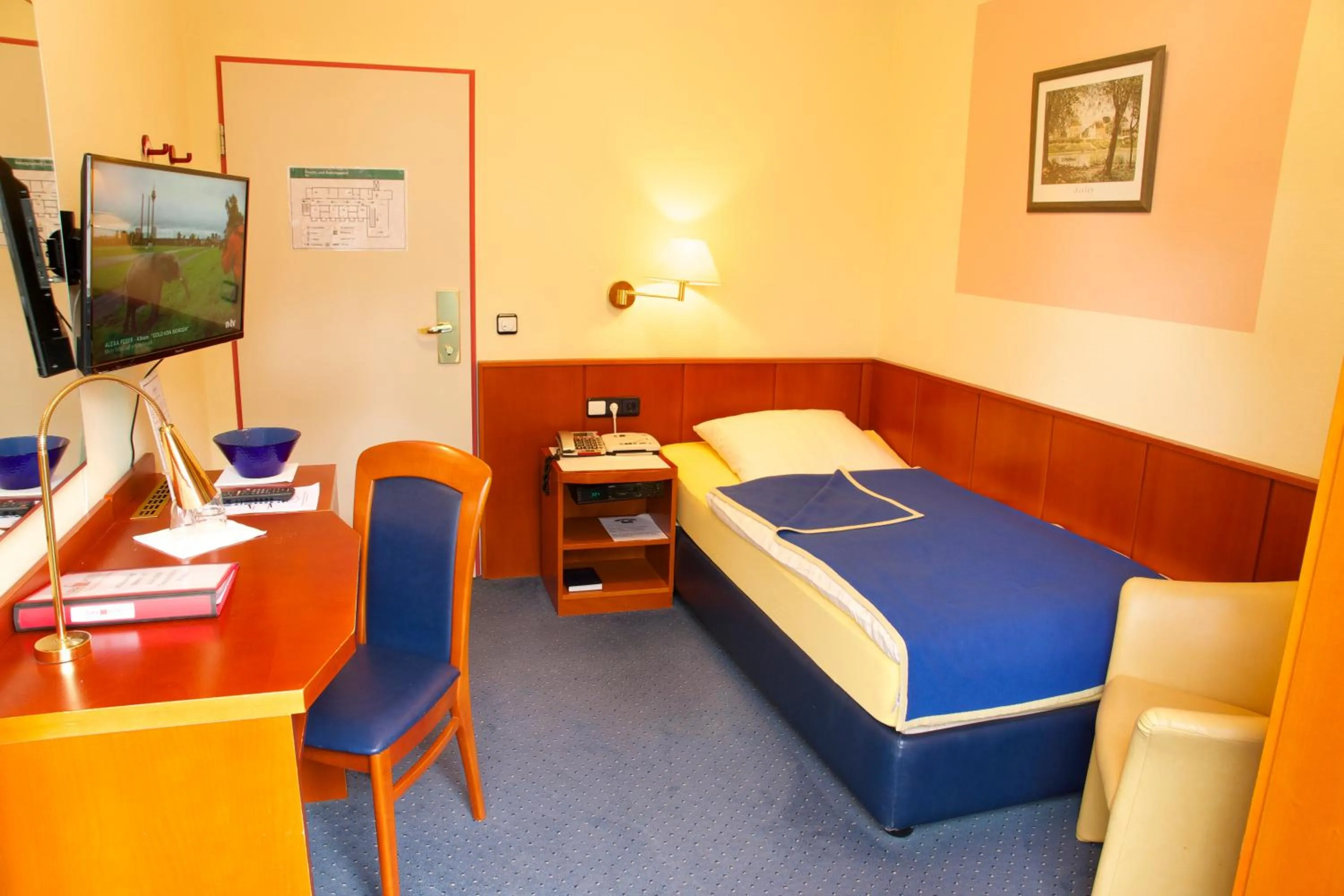 Bed in Aura Hotel