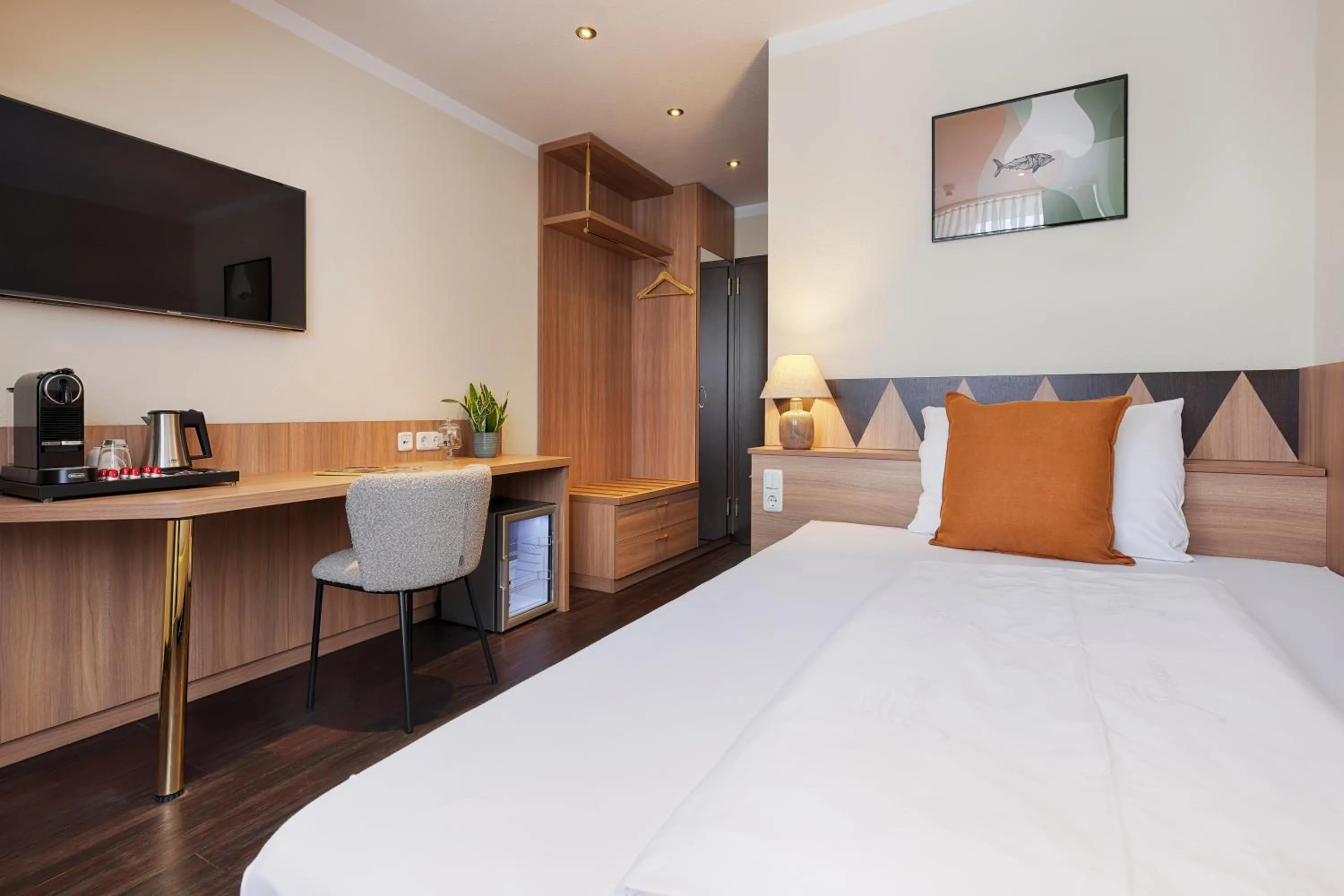 Photo of the whole room, Bed in Hotel Fischzucht in Würzburg