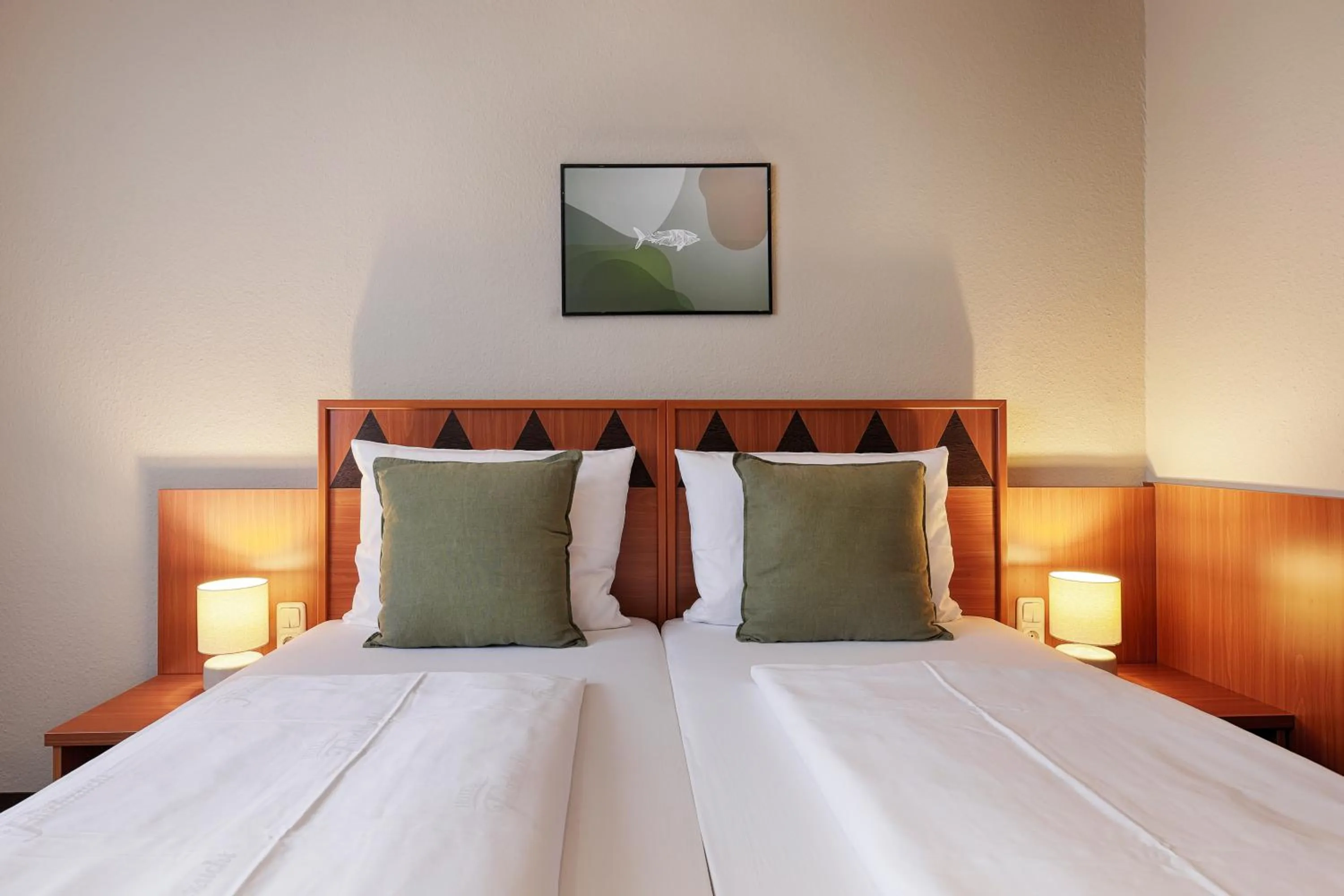 Photo of the whole room, Bed in Hotel Fischzucht in Würzburg