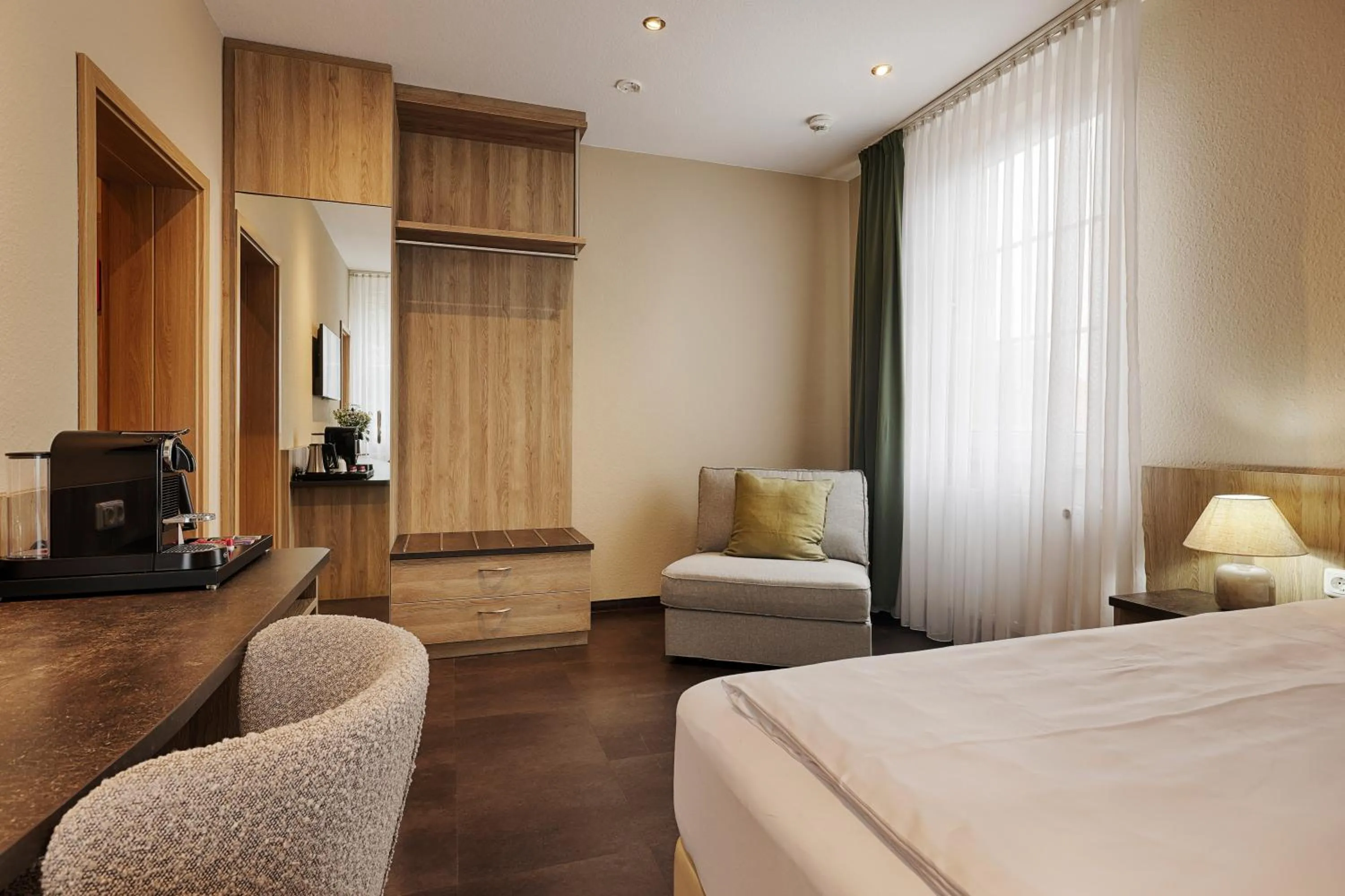 Photo of the whole room, Bed in Hotel Fischzucht in Würzburg