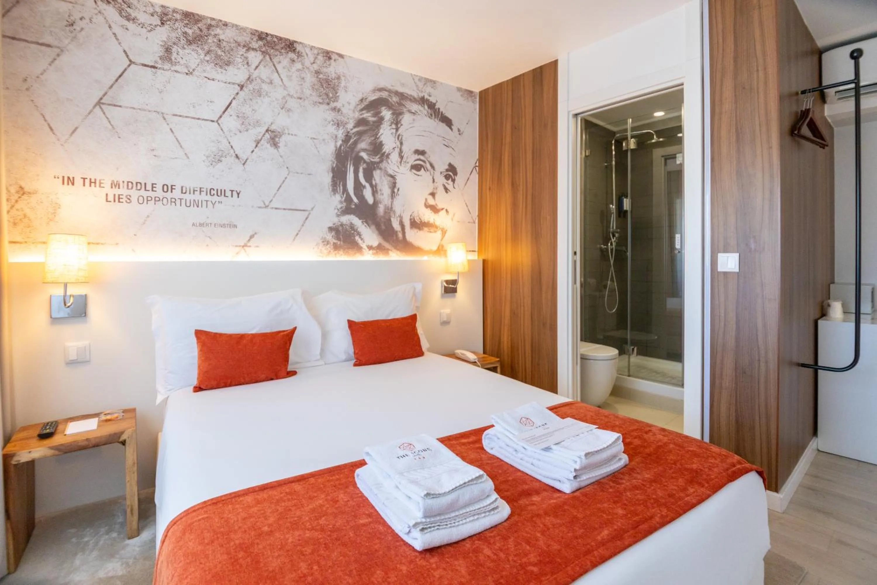 Bed in The ICONS Lisbon Hotel