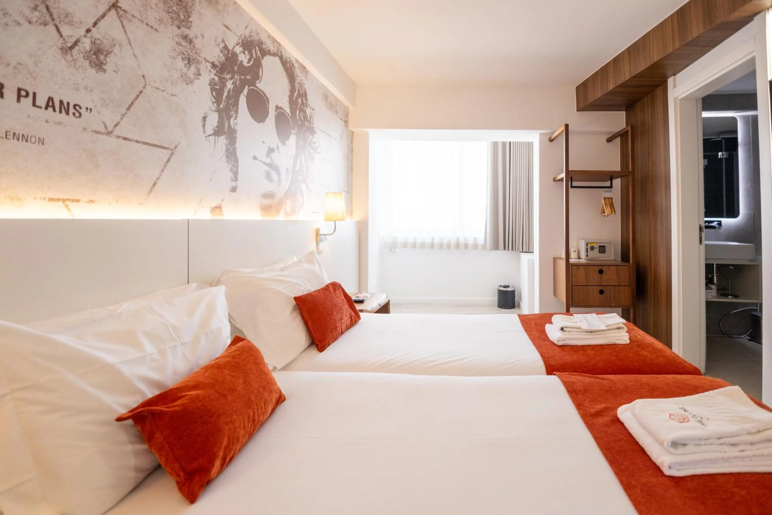 Bed in The ICONS Lisbon Hotel