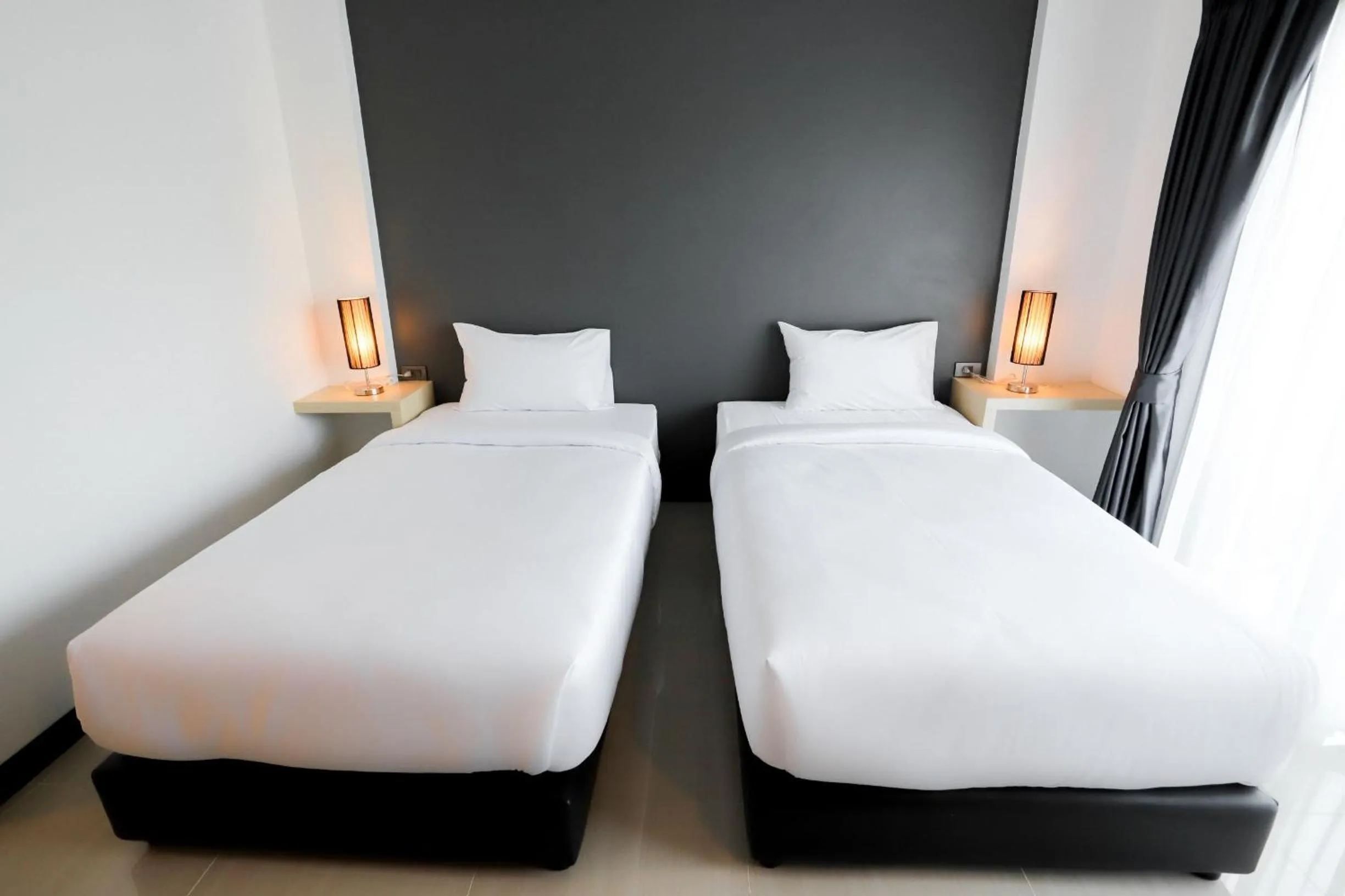 Bed in The Rest Hotel - ประจวบ