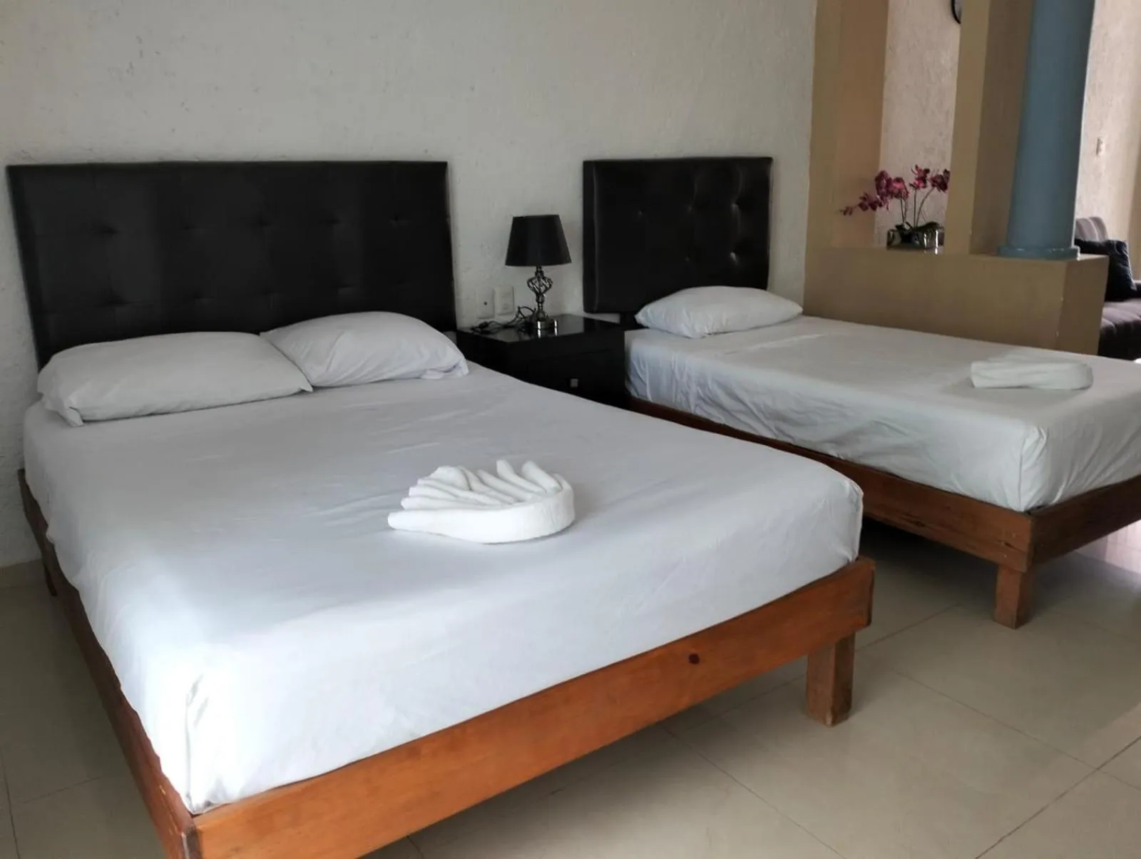 Bed in Hotel Dos Mundos, Isla Cozumel