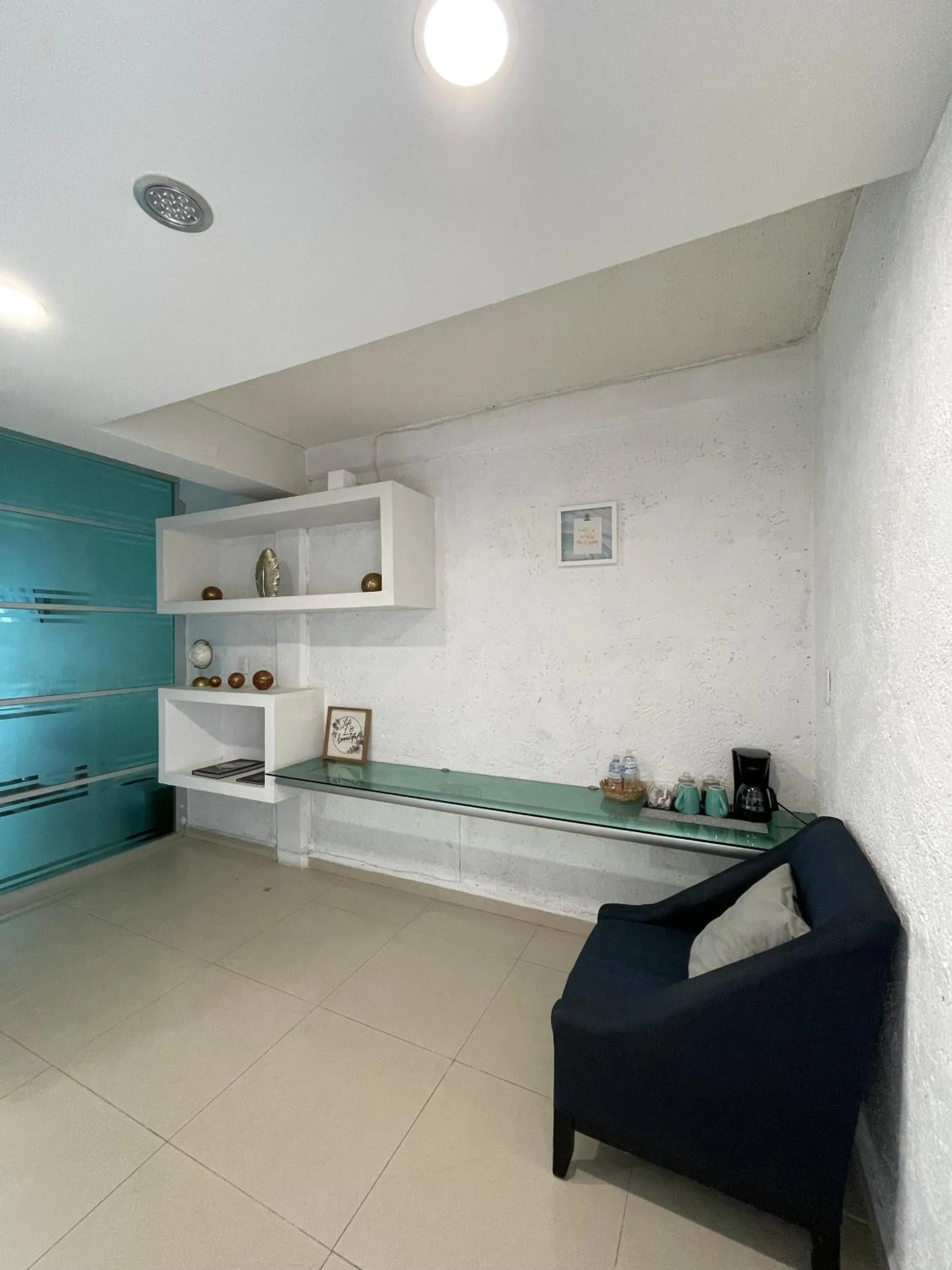 Living room in Hotel Dos Mundos, Isla Cozumel