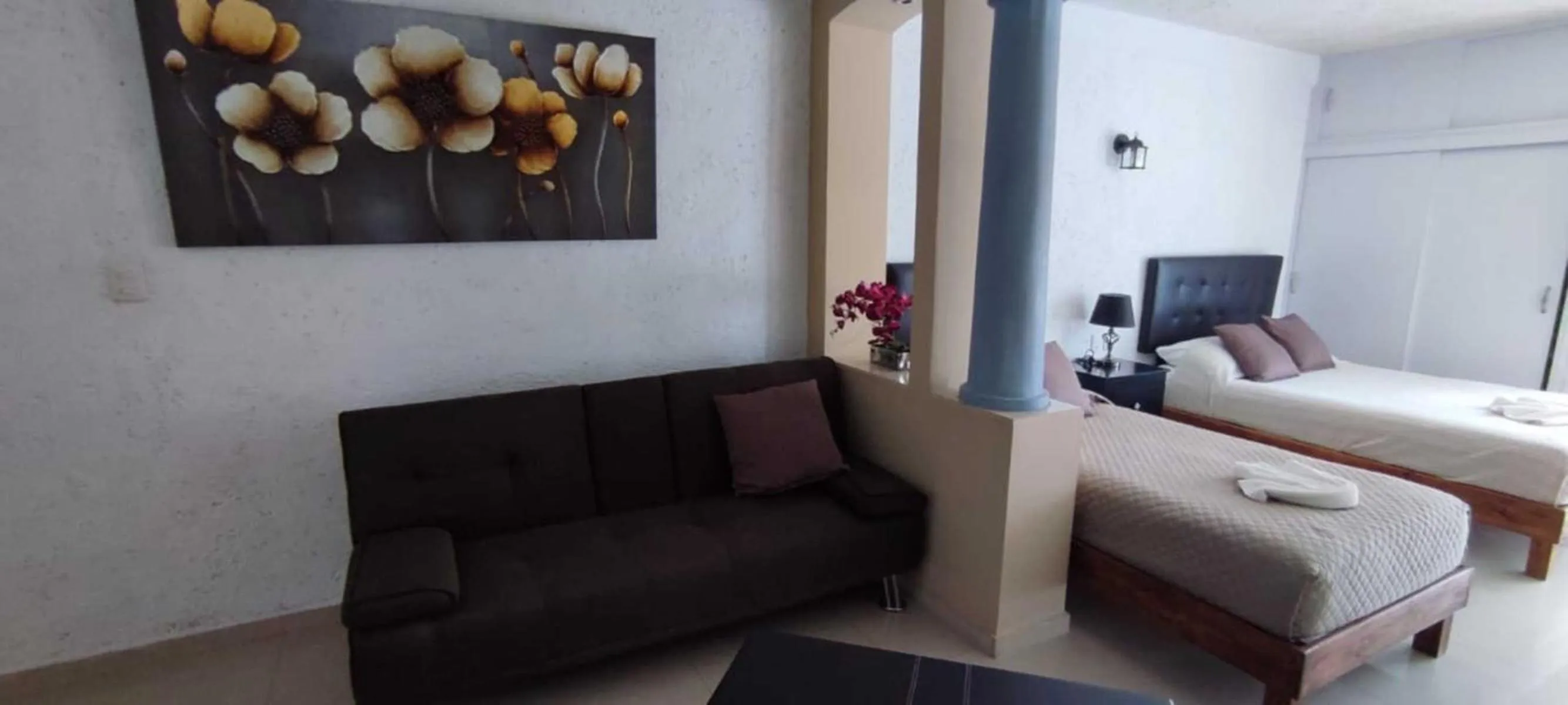 Bed in Hotel Dos Mundos, Isla Cozumel