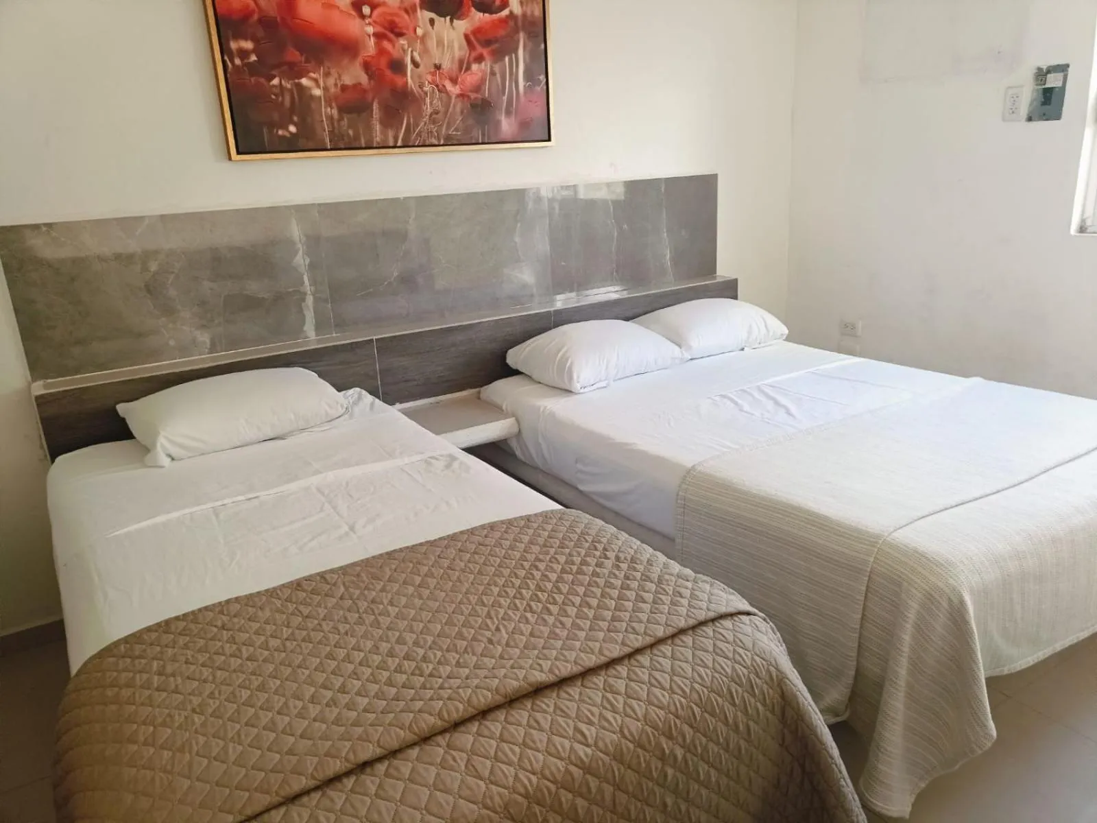 Bed in Hotel Dos Mundos, Isla Cozumel