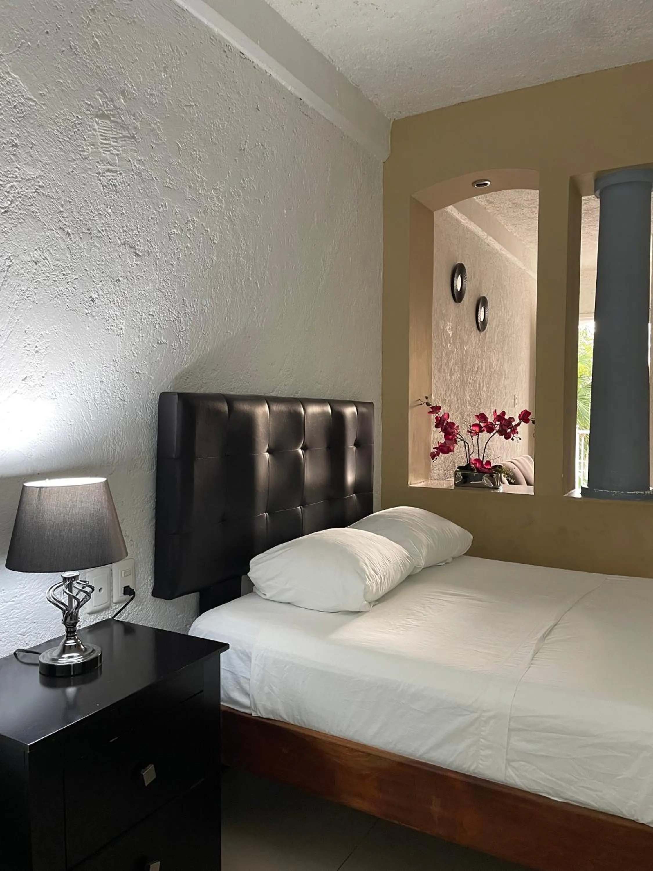 Bed in Hotel Dos Mundos, Isla Cozumel