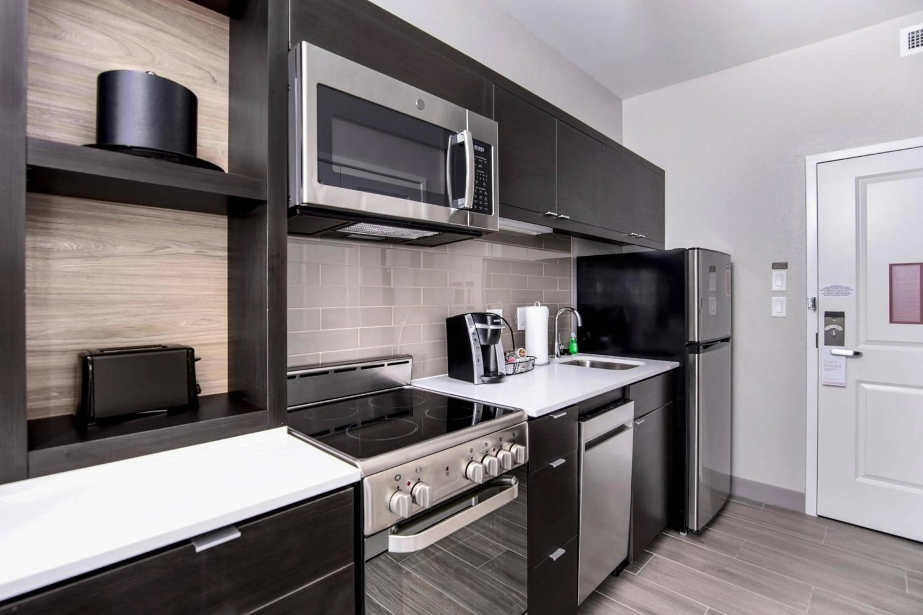 Kitchen or kitchenette in TownePlace Suites by Marriott Houston Hobby Airport