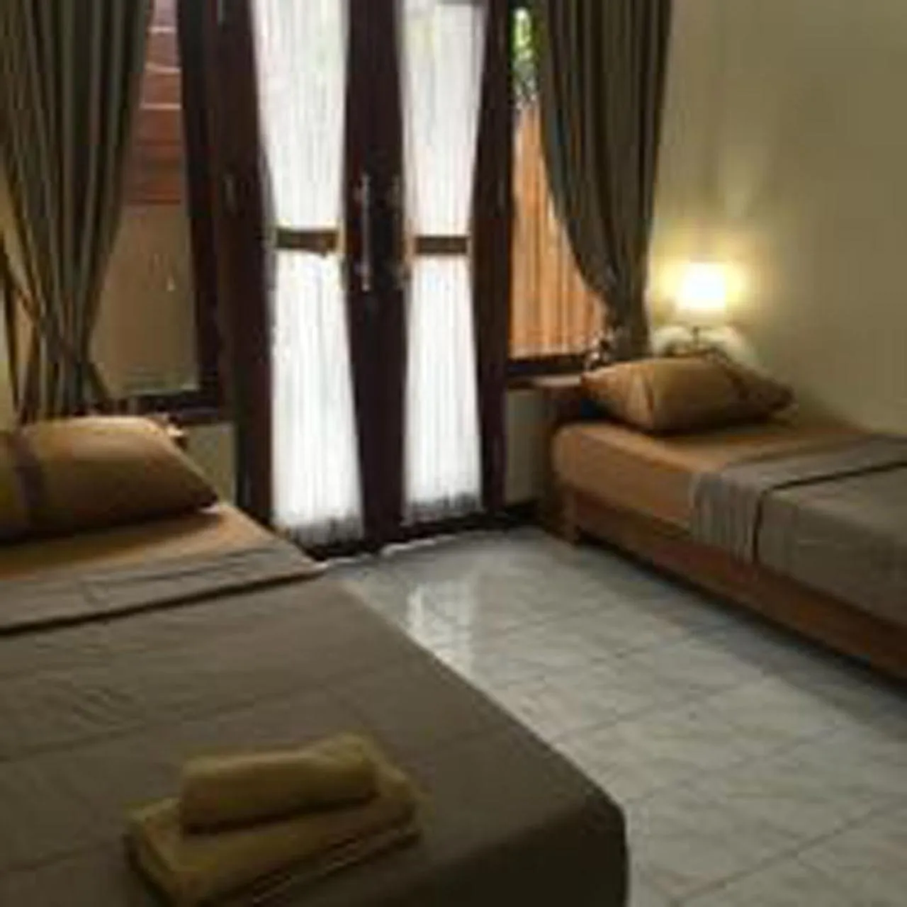 Bed in Bulan Bali Guest House