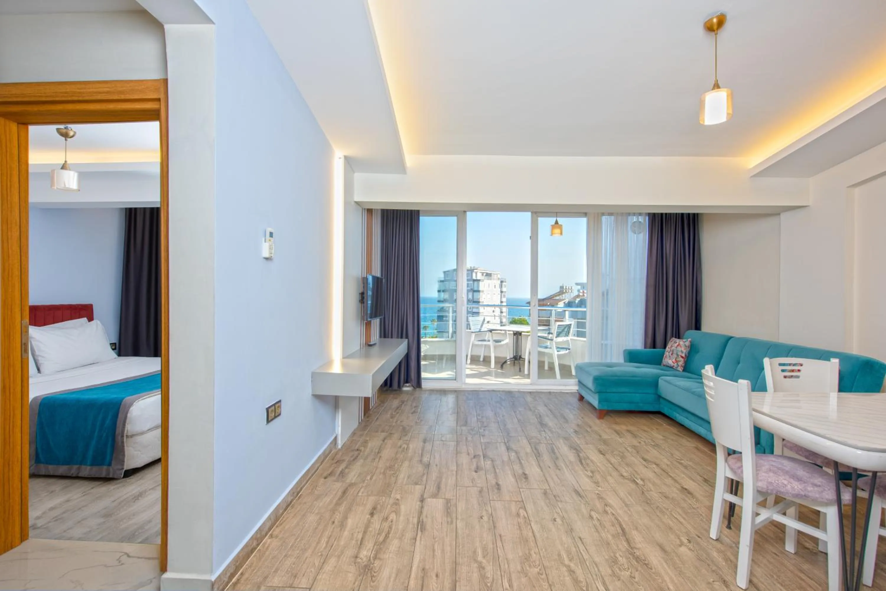 Living room, Bed in Citrus Park Hotel