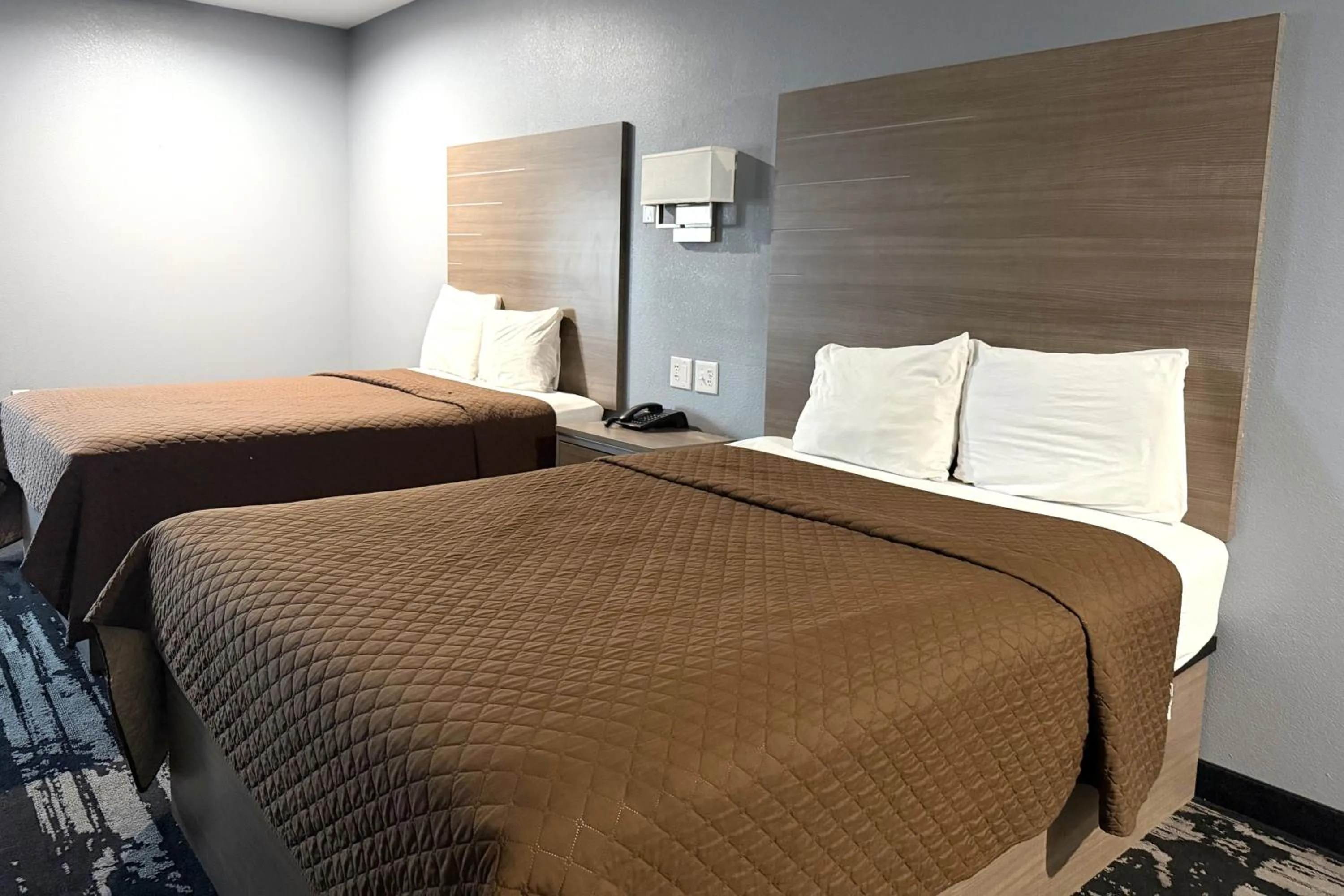 Bedroom, Bed in Hotel Royale IAH Airport North Houston I-45