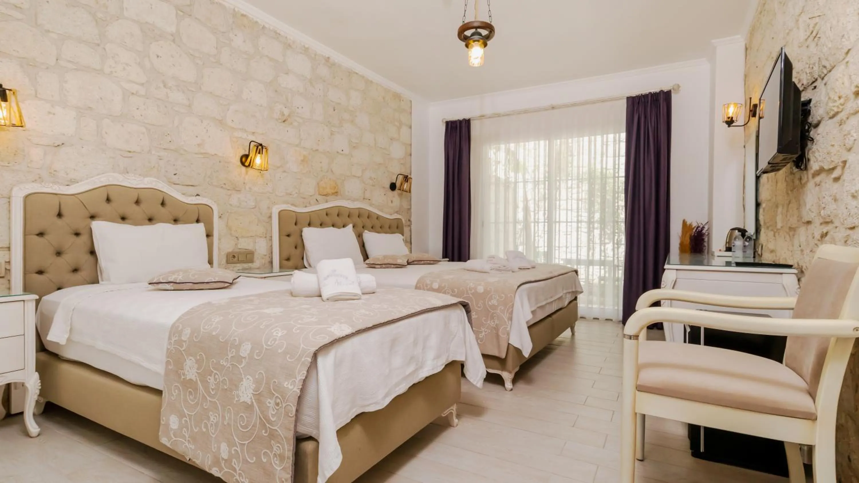 Bed in Avlu Alaçatı Boutique Hotel