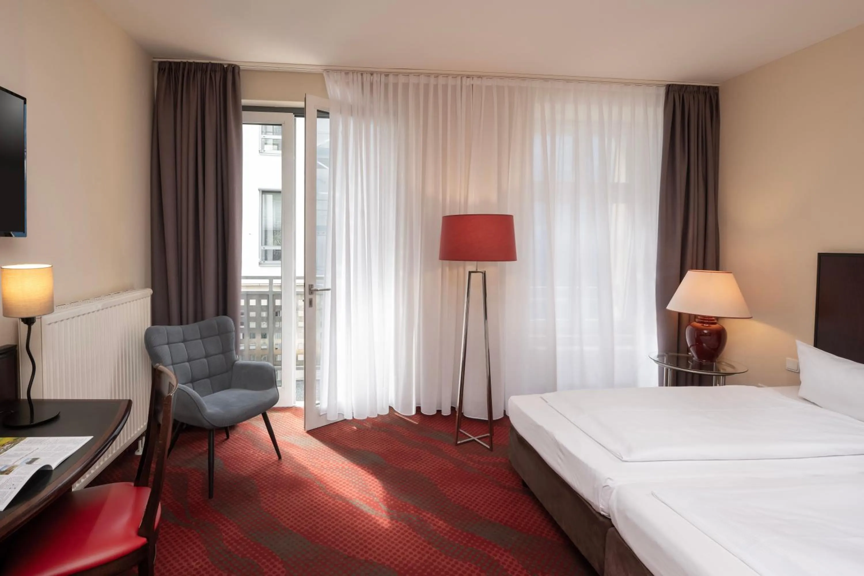 Photo of the whole room, Bed in SORAT Hotel Cottbus