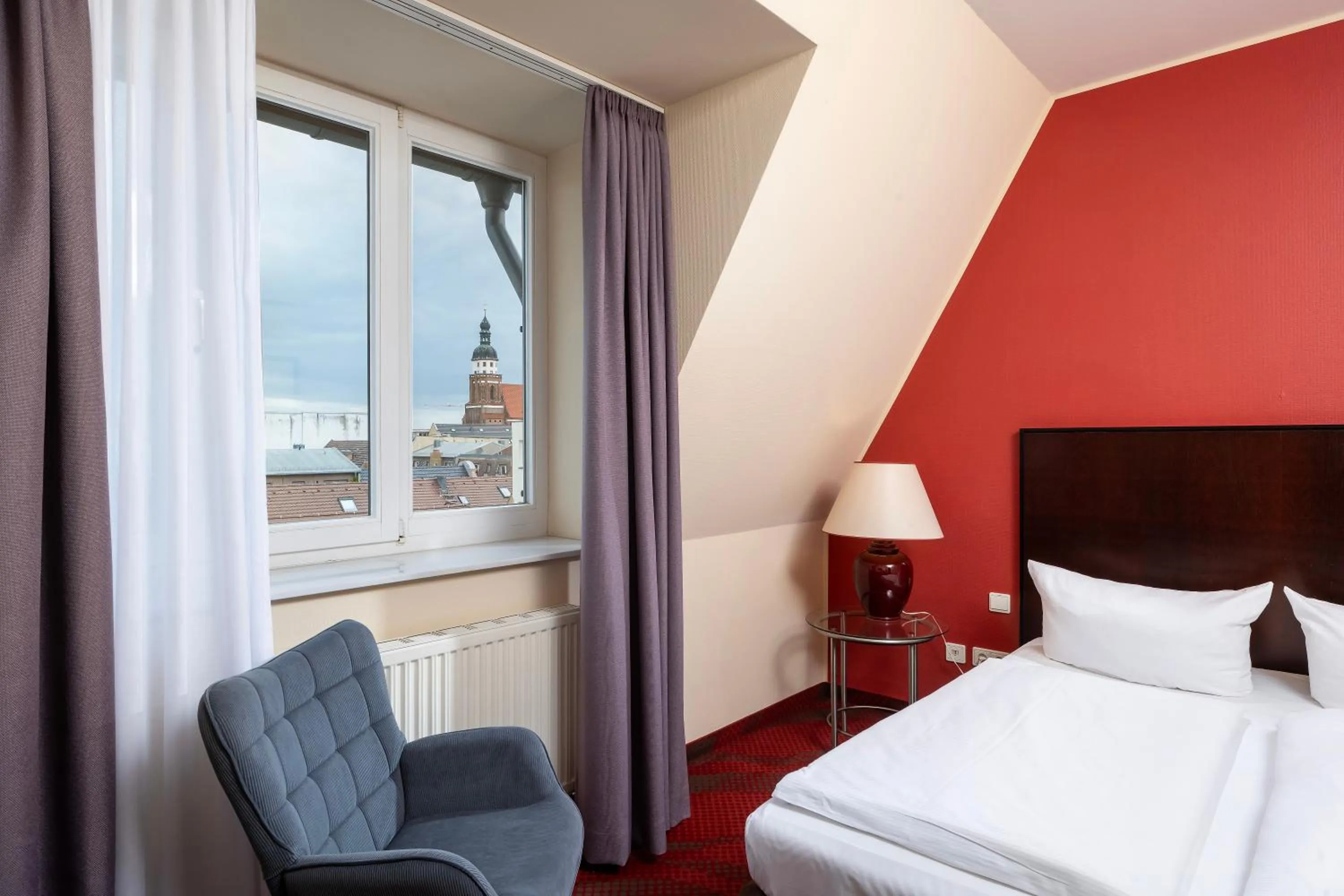 Bed in SORAT Hotel Cottbus