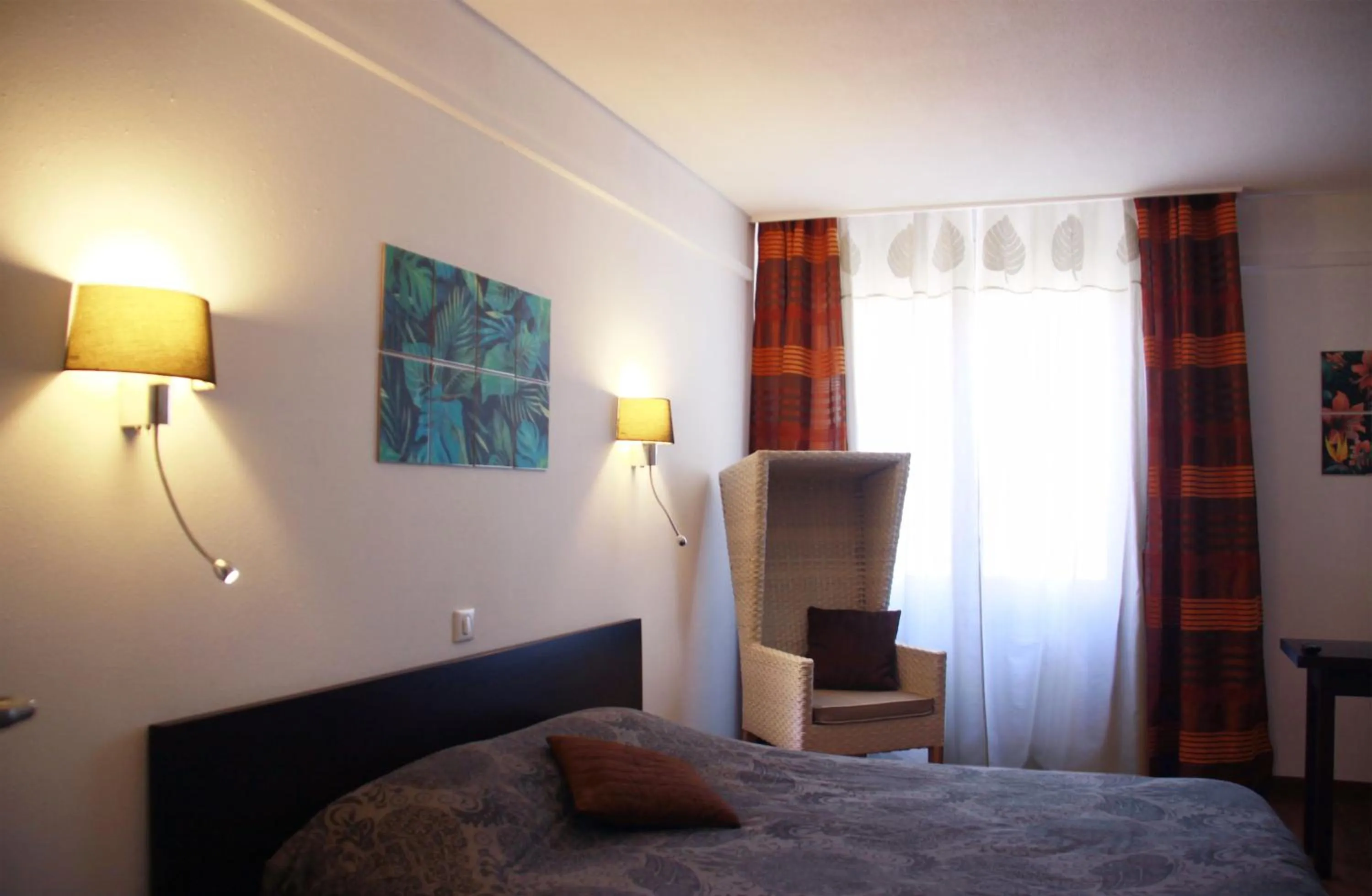 Bed in L'EMBLEME - BOUTIQUE HOTEL