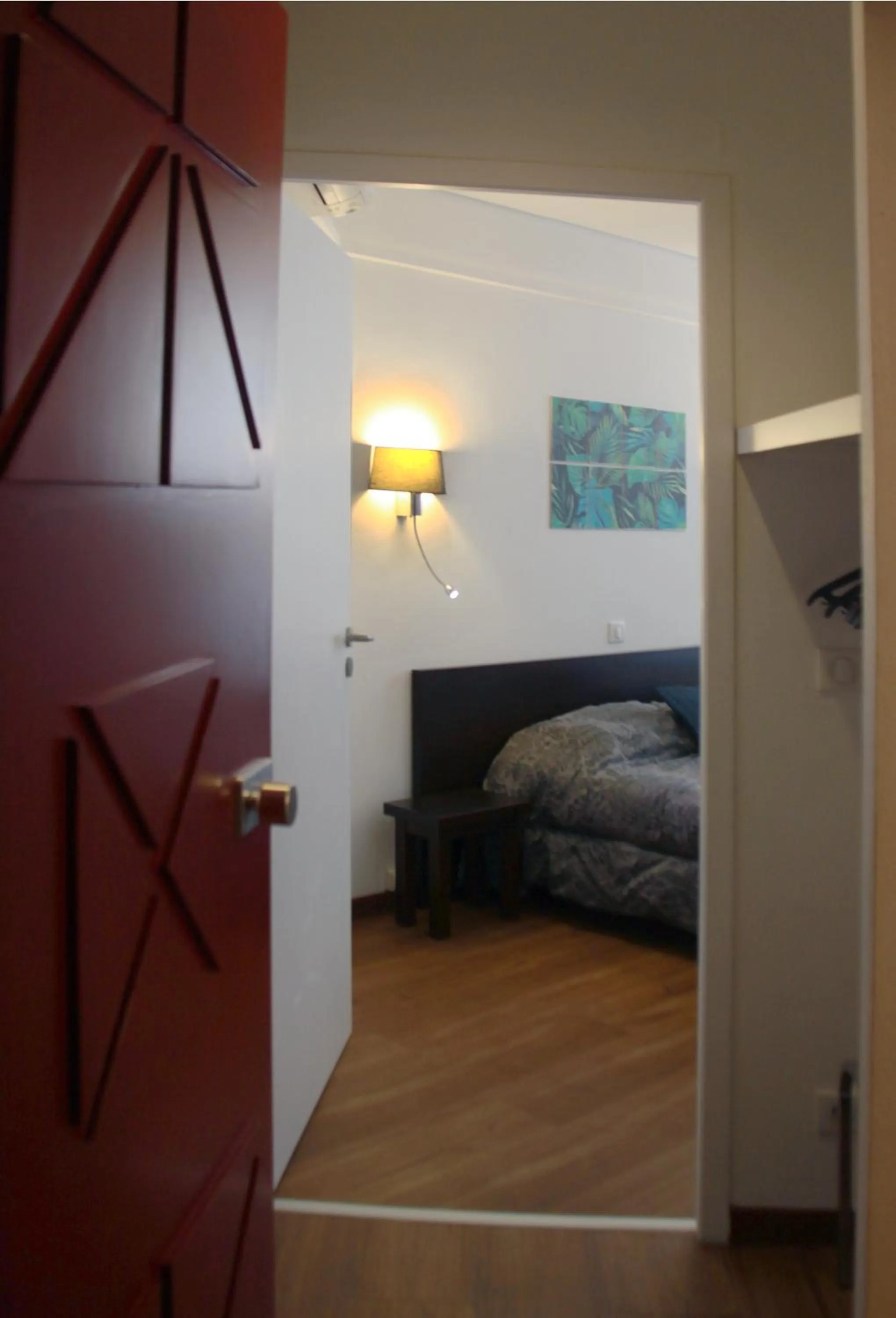 Bed in L'EMBLEME - BOUTIQUE HOTEL