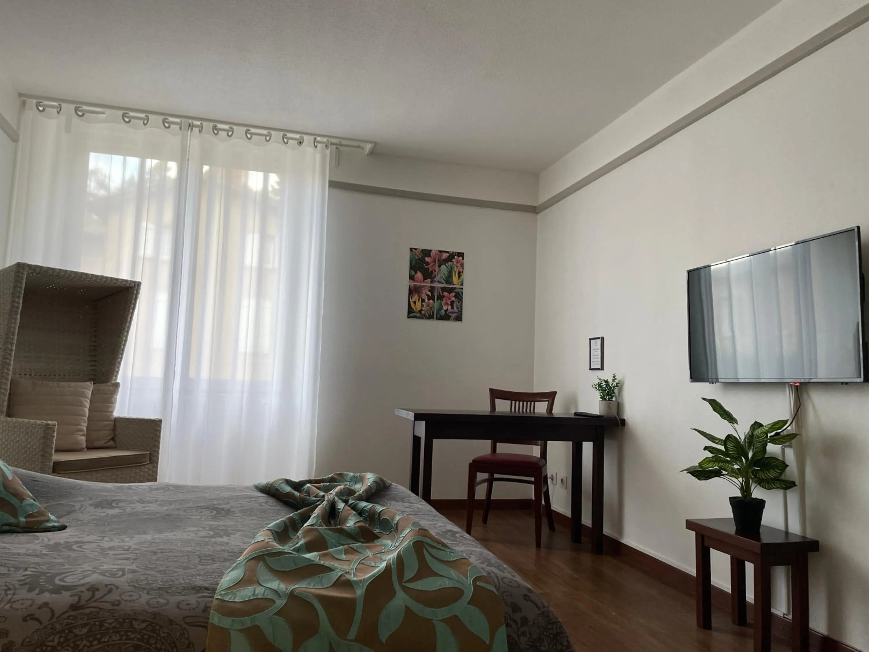 Bed in L'EMBLEME - BOUTIQUE HOTEL