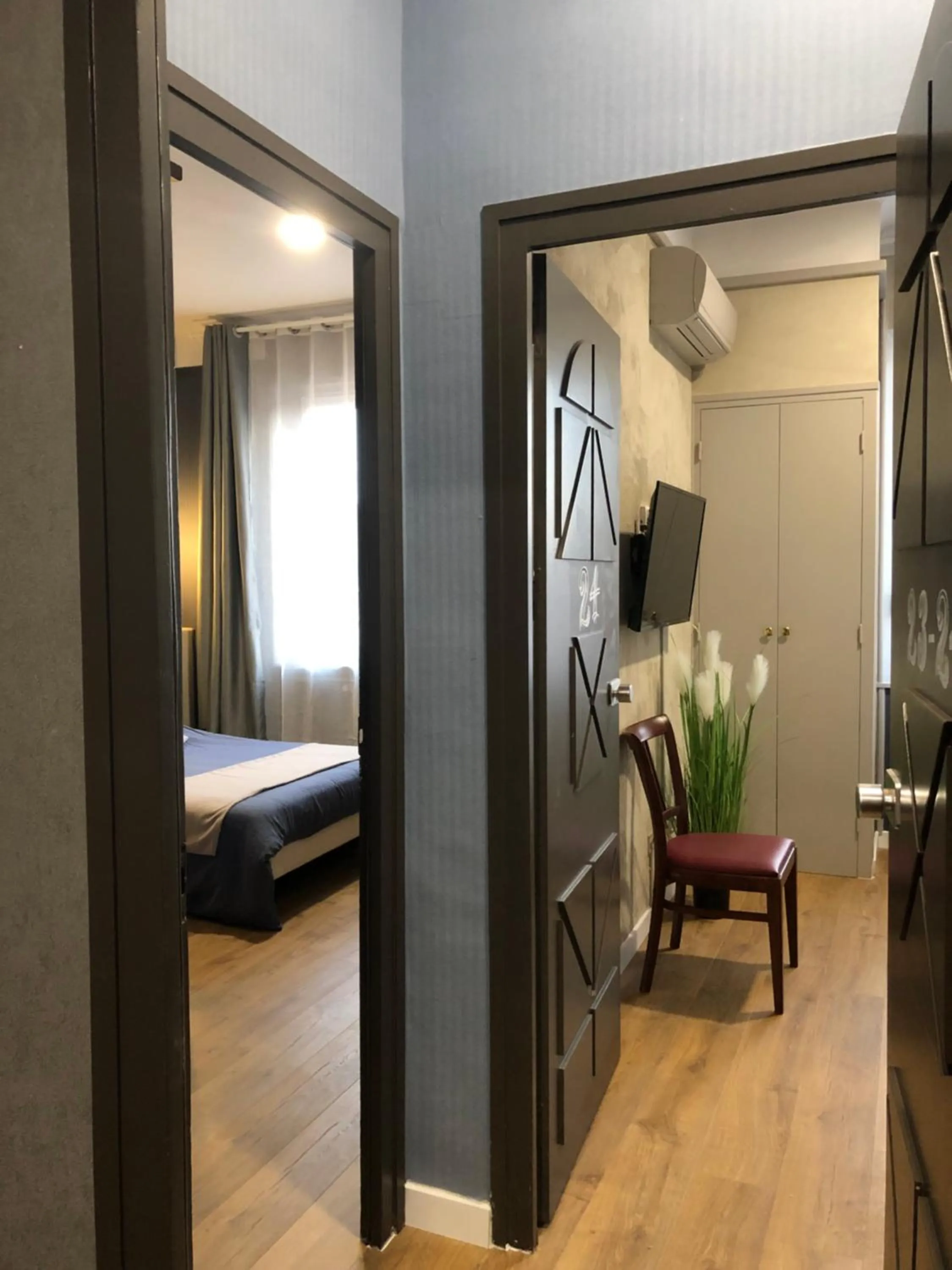 Bed in L'EMBLEME - BOUTIQUE HOTEL