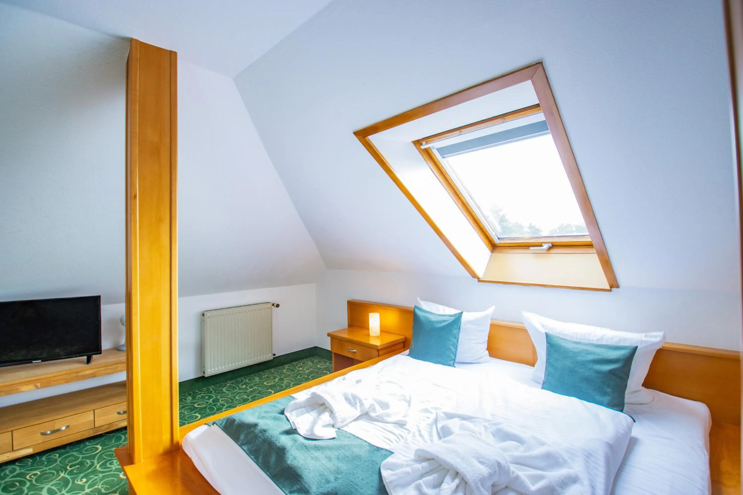 Photo of the whole room, Bed in Ferien Hotel Spreewald