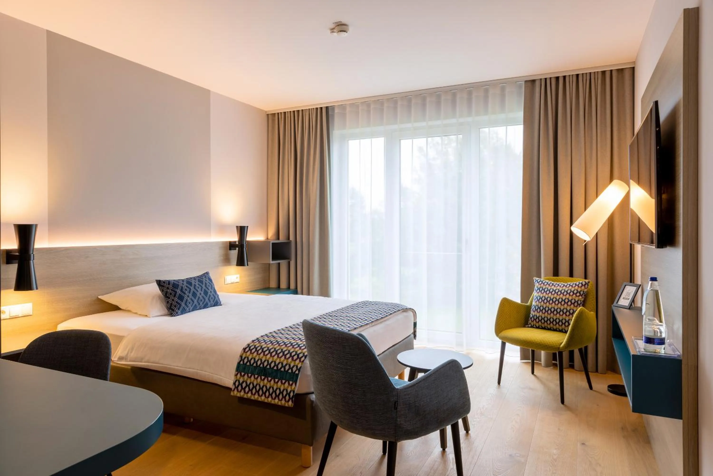 Photo of the whole room, Bed in Best Western Plus Parkhotel Maximilian Ottobeuren