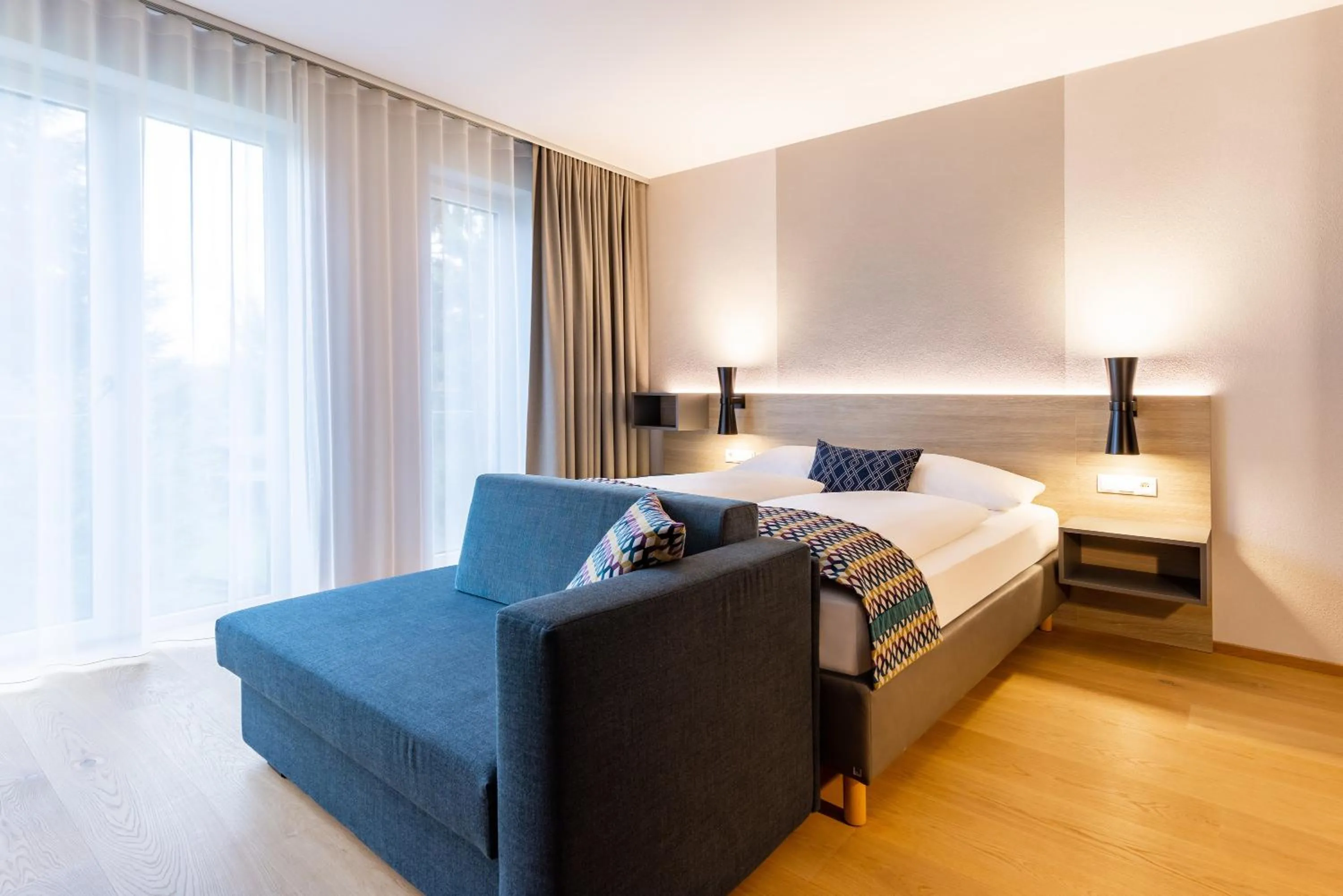 Photo of the whole room, Bed in Best Western Plus Parkhotel Maximilian Ottobeuren