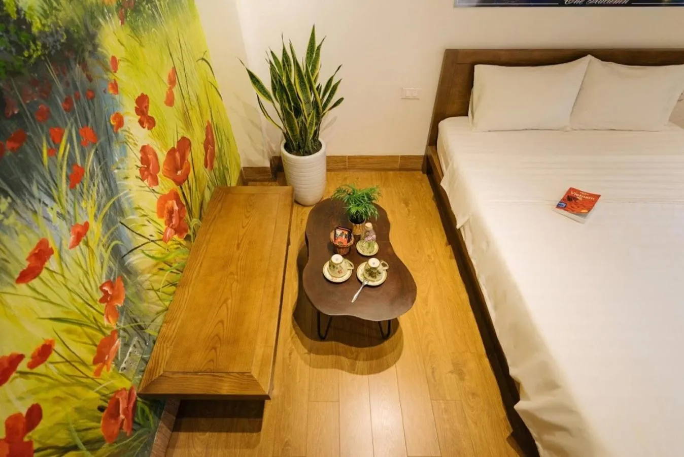 Seating area, Bed in The Autumn Homestay