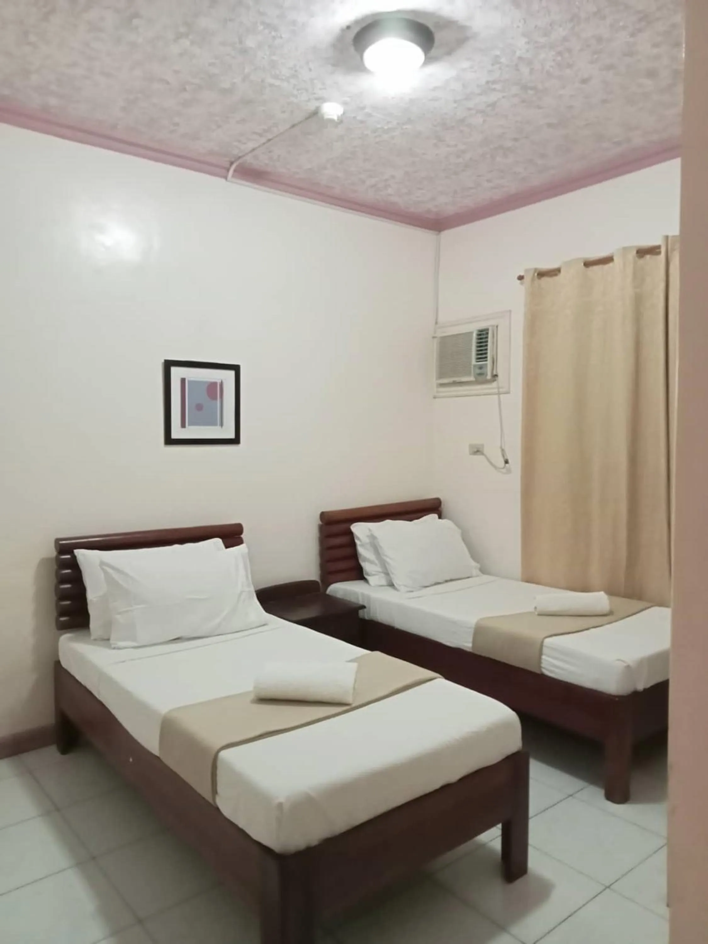 Bed in RedDoorz at Casa Marabella Villamonte Bacolod City