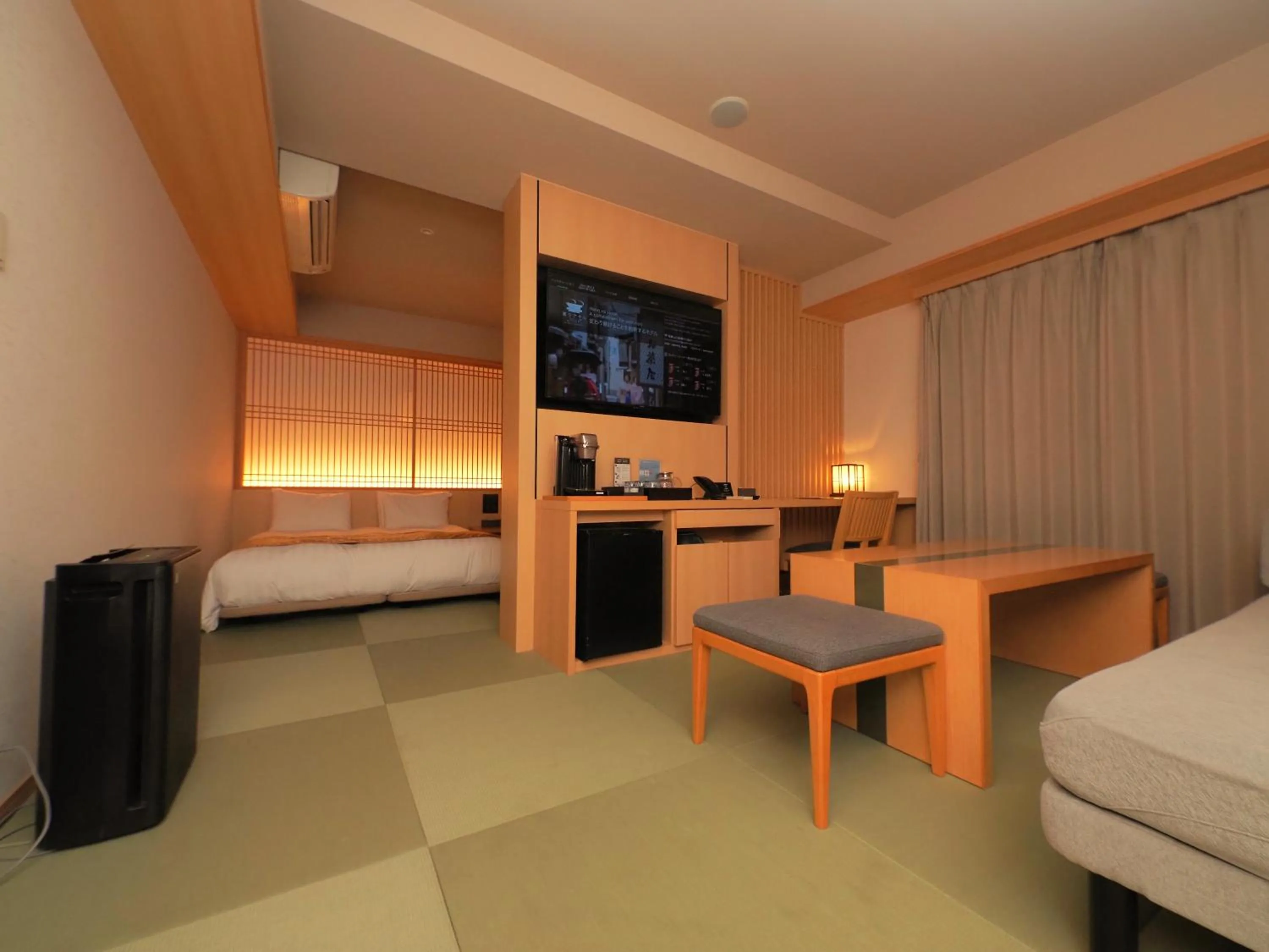 Bed in Henn na Hotel Premier Kyoto Gojo Karasuma -Formerly Watermark Hotel Kyoto-