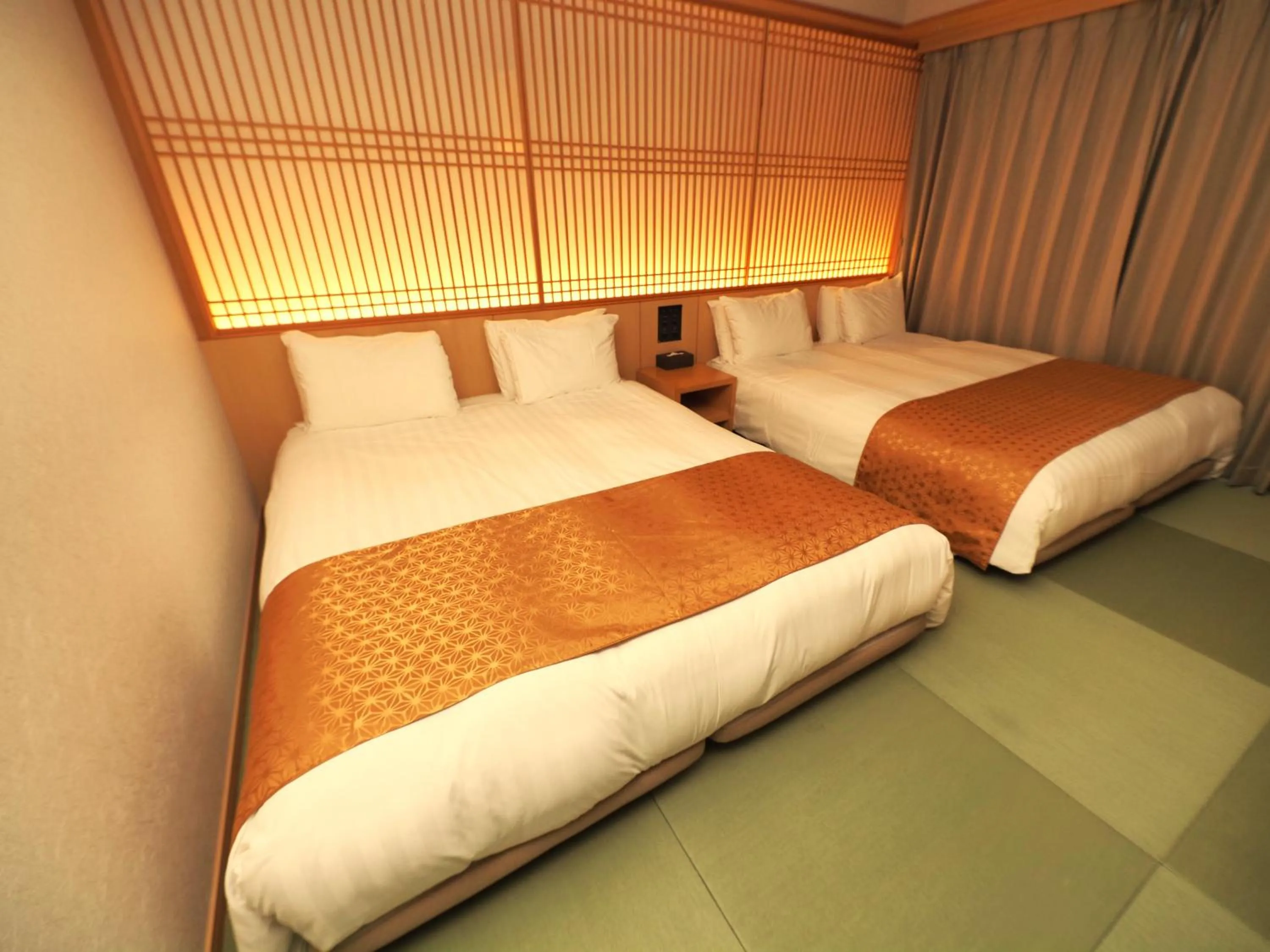Bed in Henn na Hotel Premier Kyoto Gojo Karasuma -Formerly Watermark Hotel Kyoto-