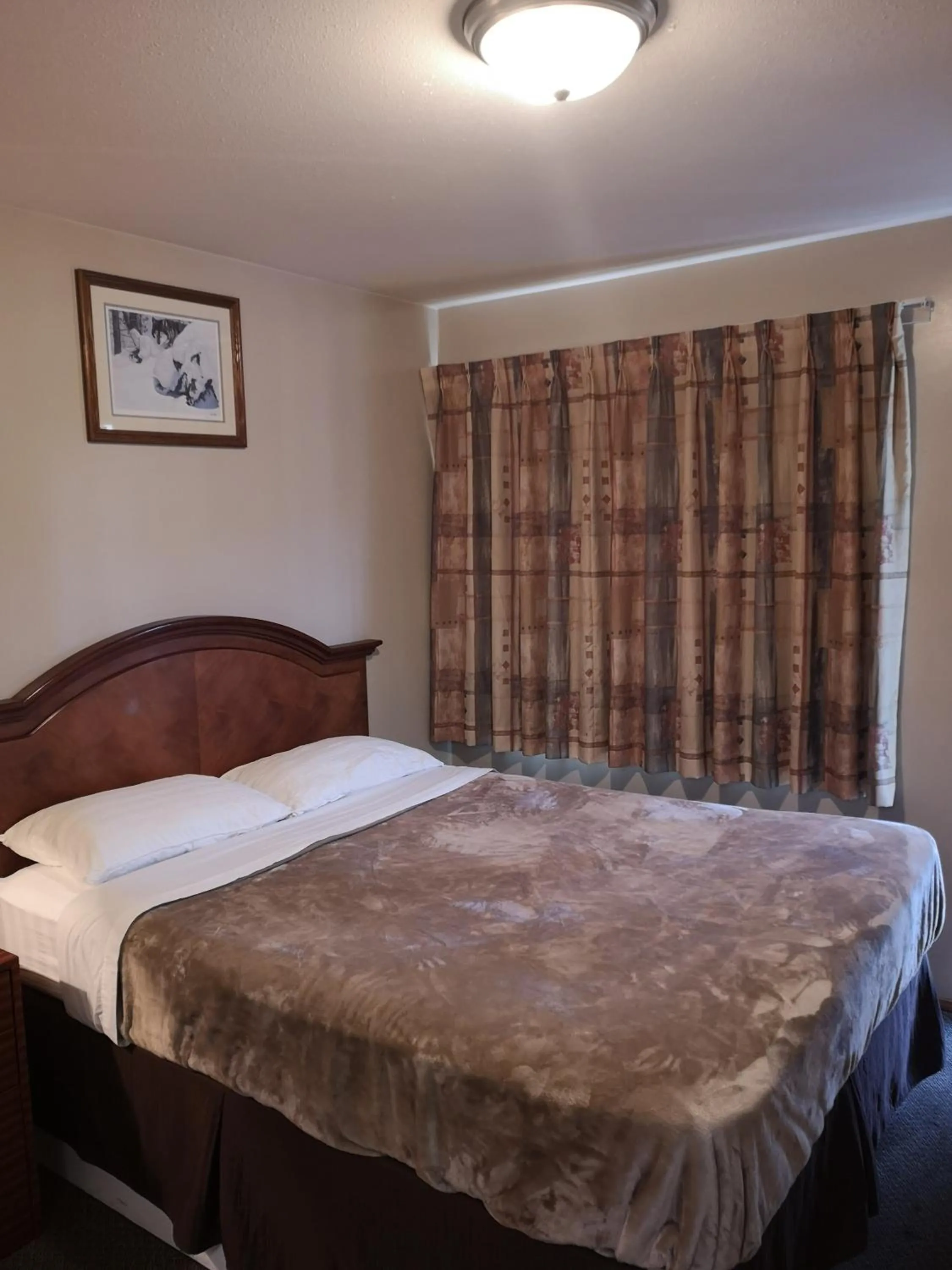 Bed in Ranchland Villa Motel