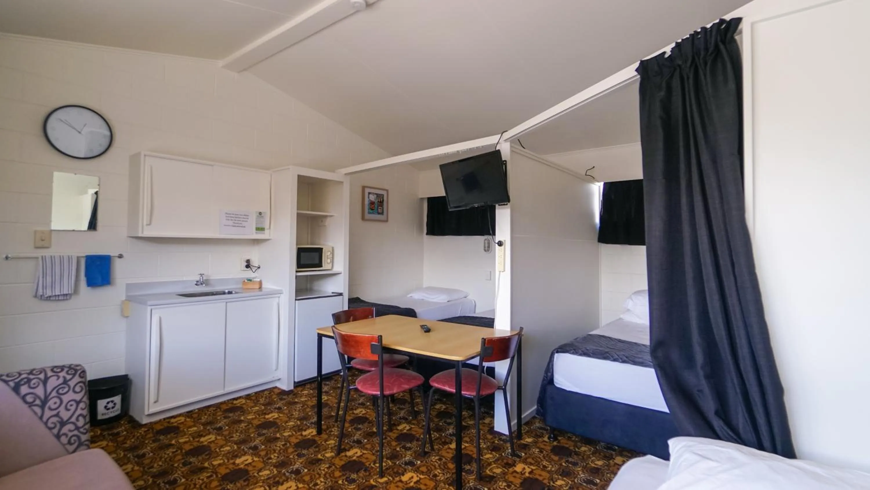 Living room in Whangarei Central Holiday Park