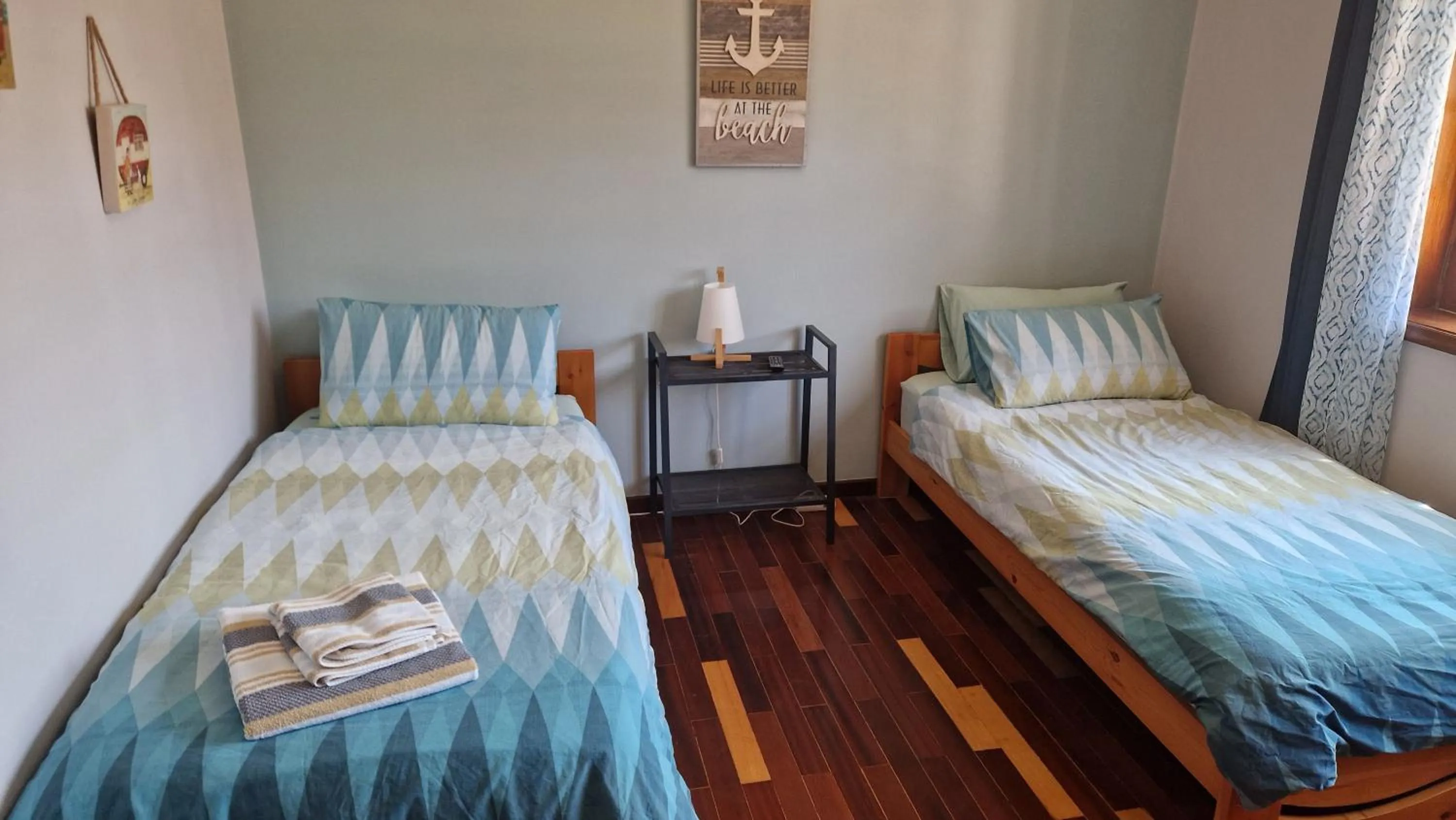 Bedroom, Bed in Beachwalk guesthouse