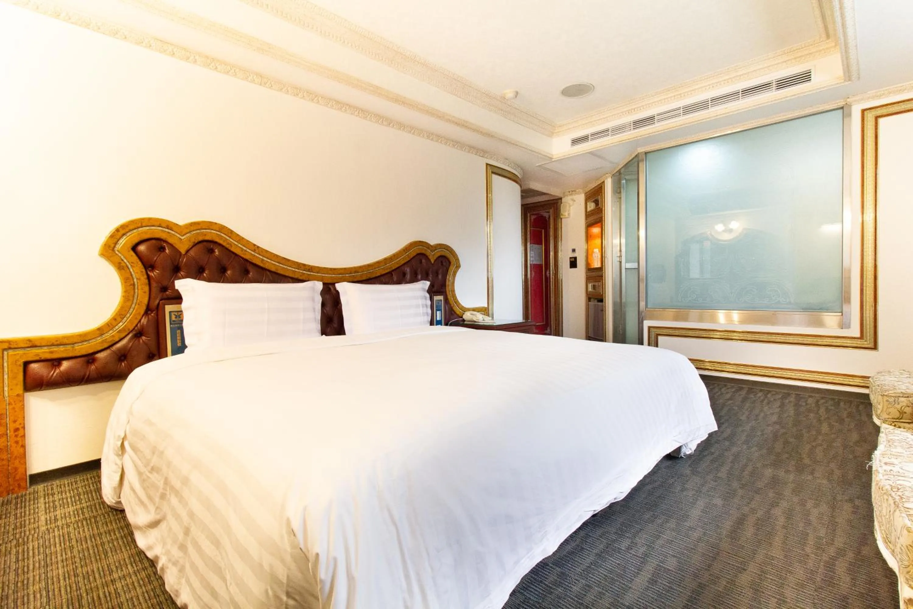 Bed in Baron's Hot Spring Hotel