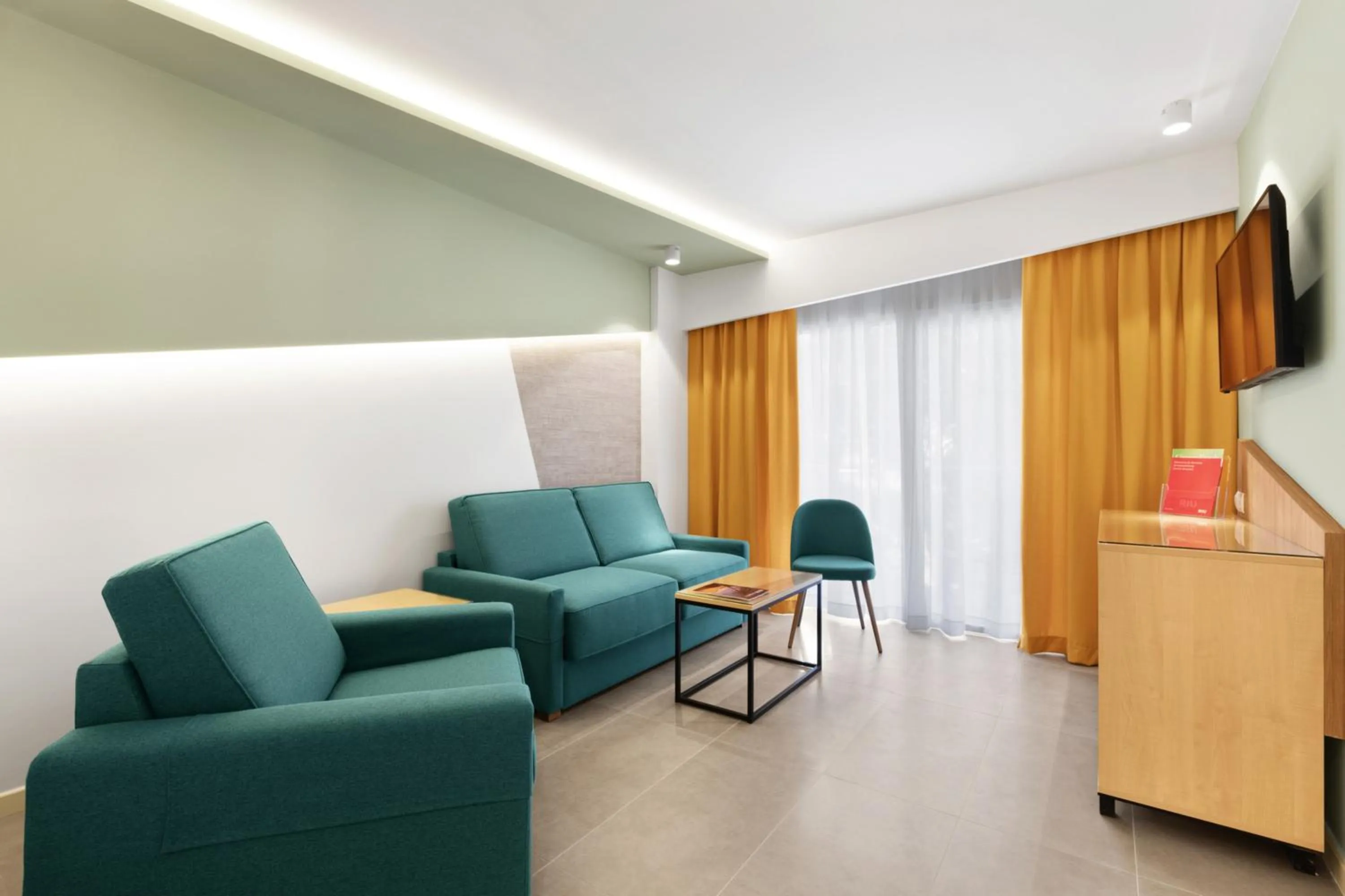 Living room in Hotel Riu Playa Park - 0'0 All Inclusive